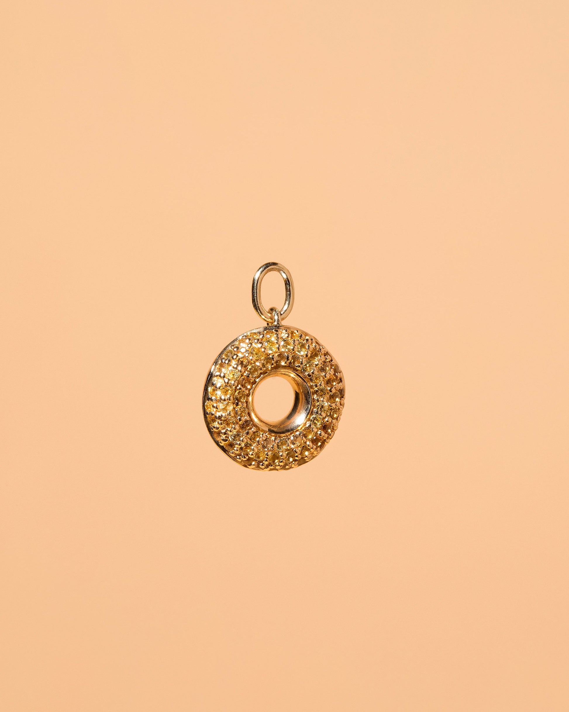 Lemon Donut Charm on light color background.