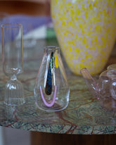 Styled image featuring closeup detail of the FACEVESSEL Bud Vase.