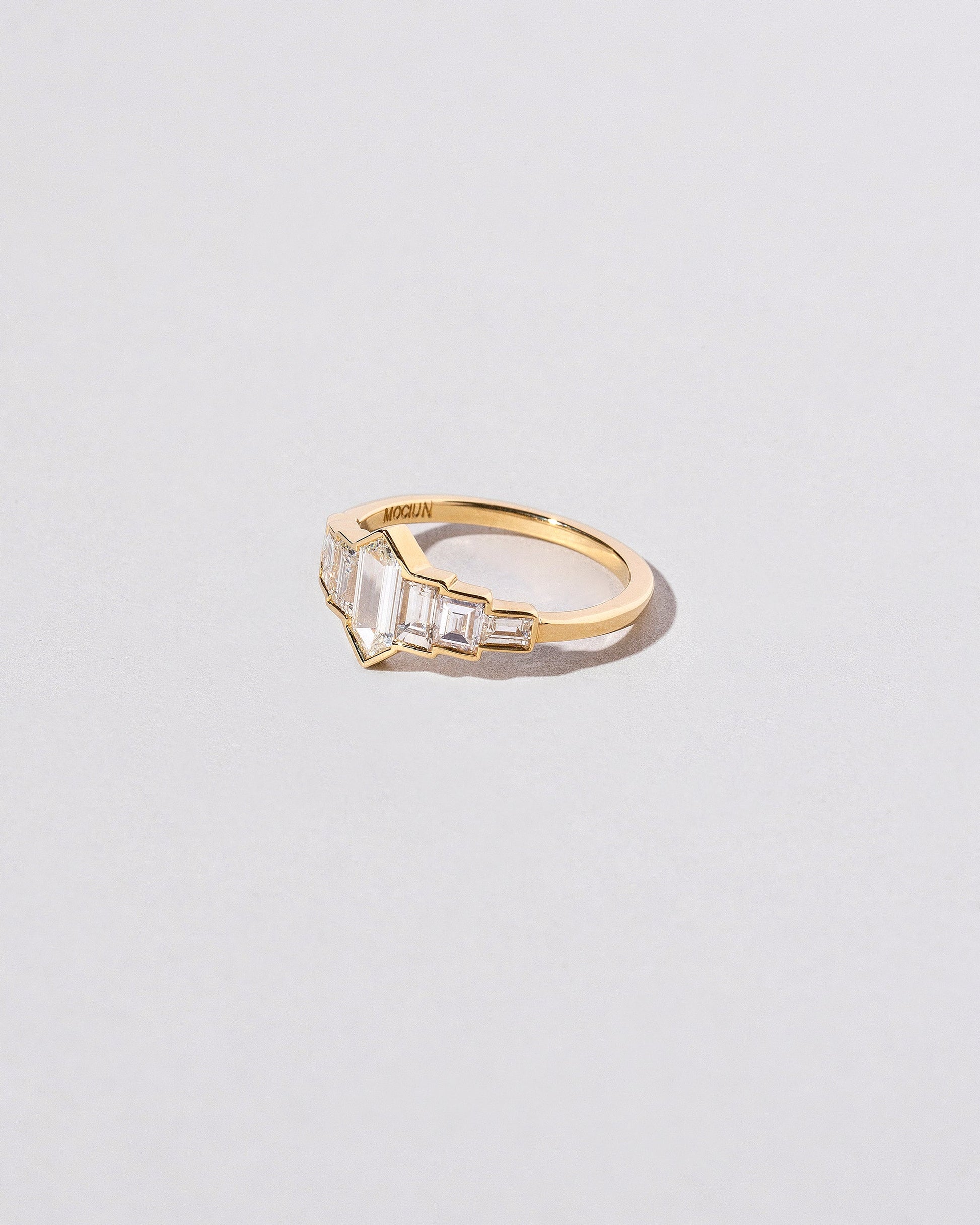  Septet Ring on light color background.