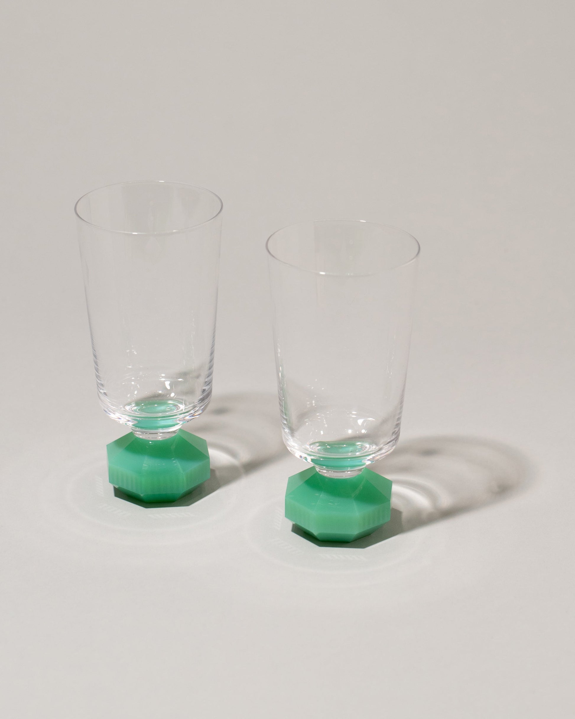 Closeup view of the Reflections Copenhagen Mint Chelsea Glass Sets on light color background.