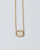  Arrow Intaglio Necklace on light color background.