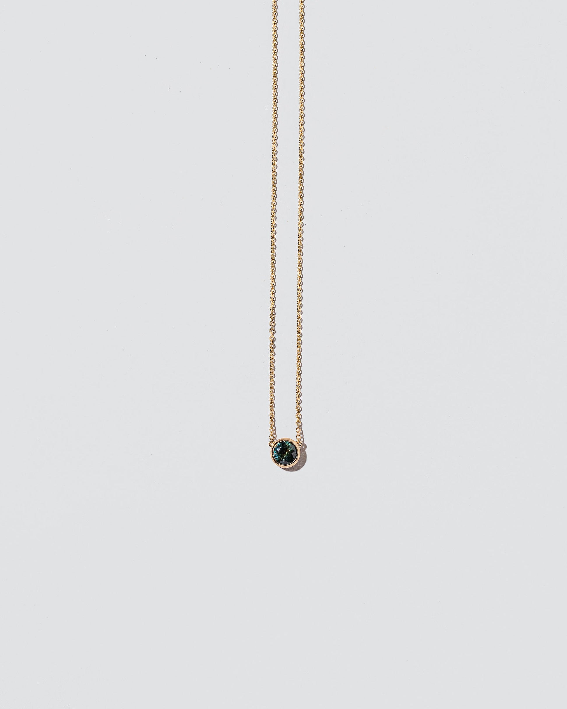  Triadic Necklace on light color background.