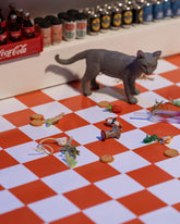 Styled image featuring the Red Apple Core Charm.