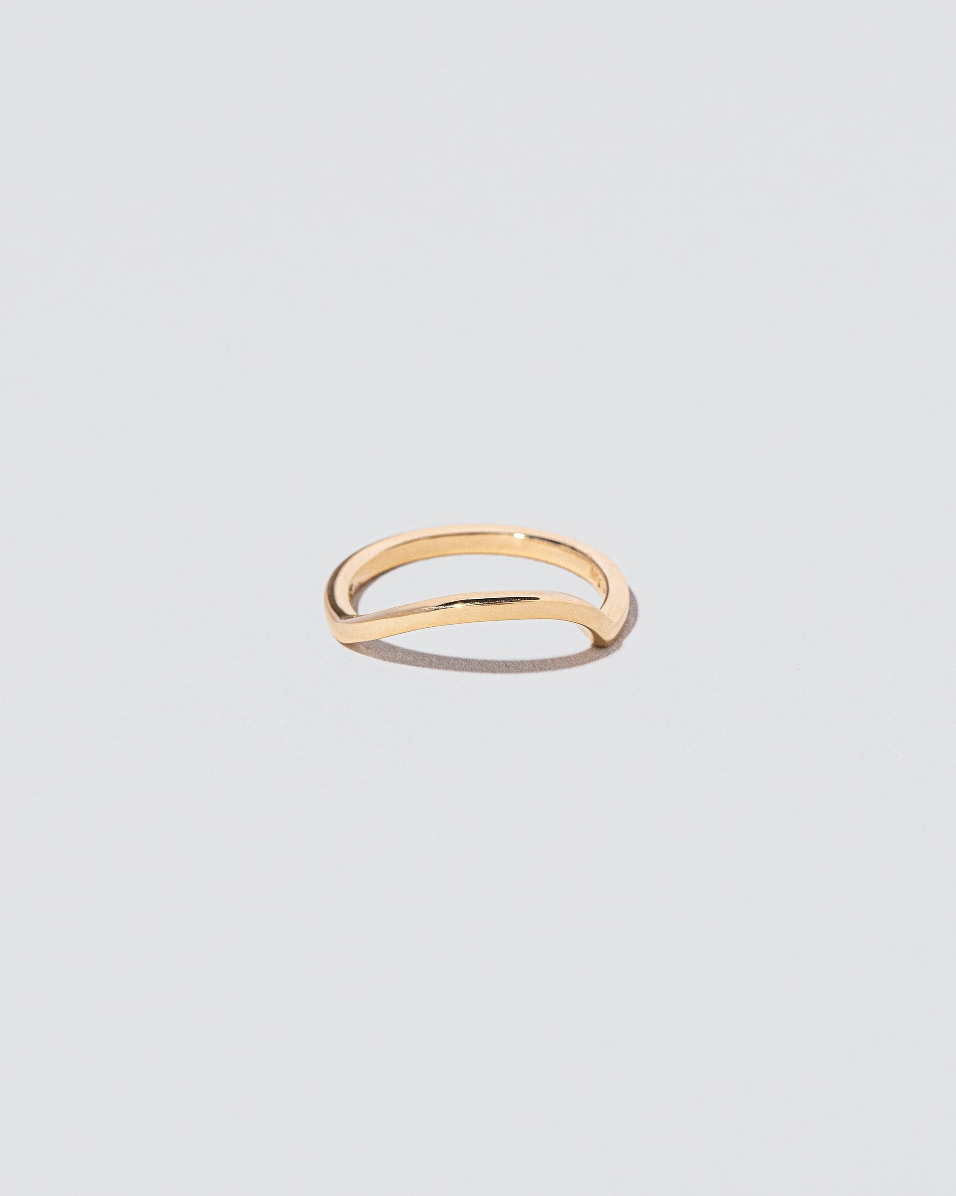 Gold Solid Square Wire Right Slump Band on light color background.