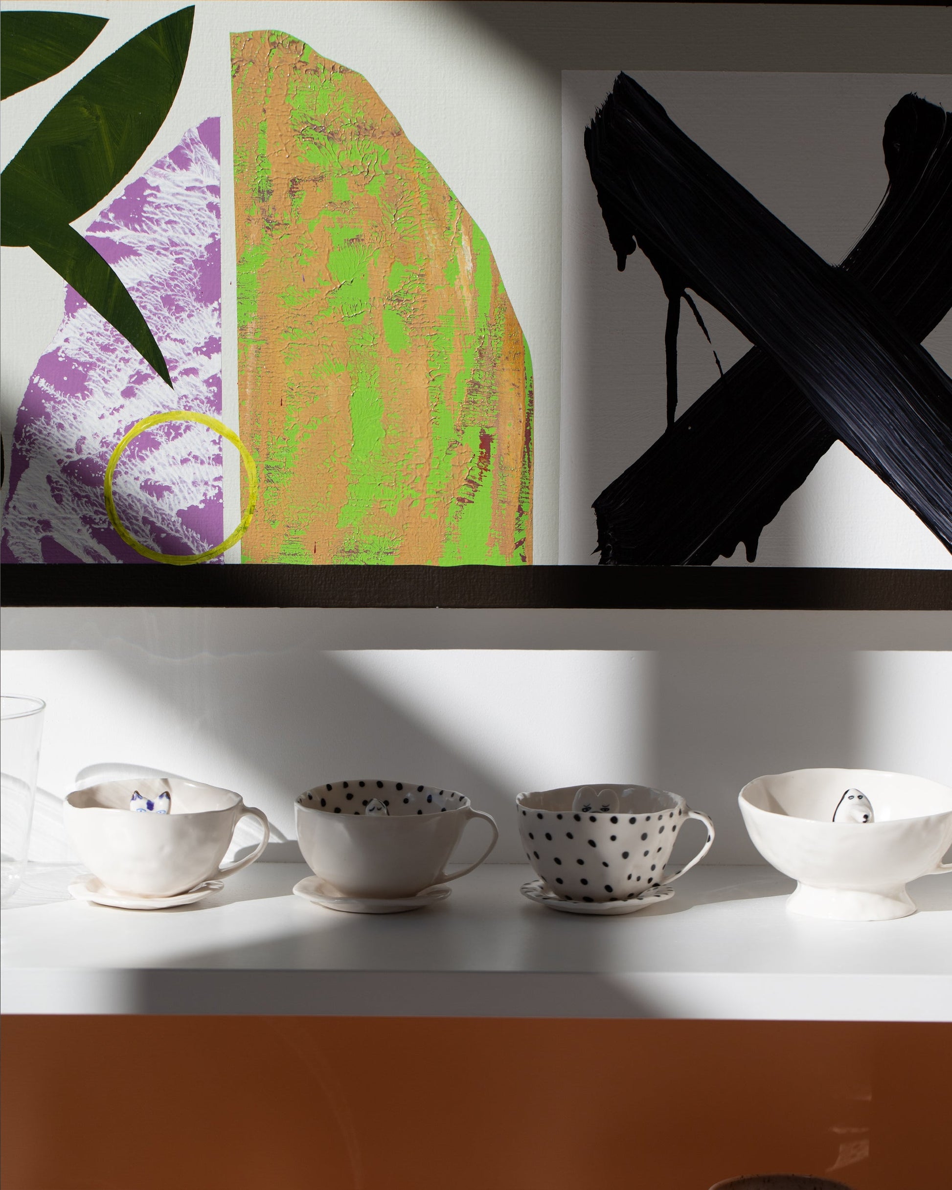 Styled image featuring the Eleonor Boström Default Title and Blue Spots Dog Cup Cat Tea Cup with Saucer and Dog Tea Cup & Saucers.