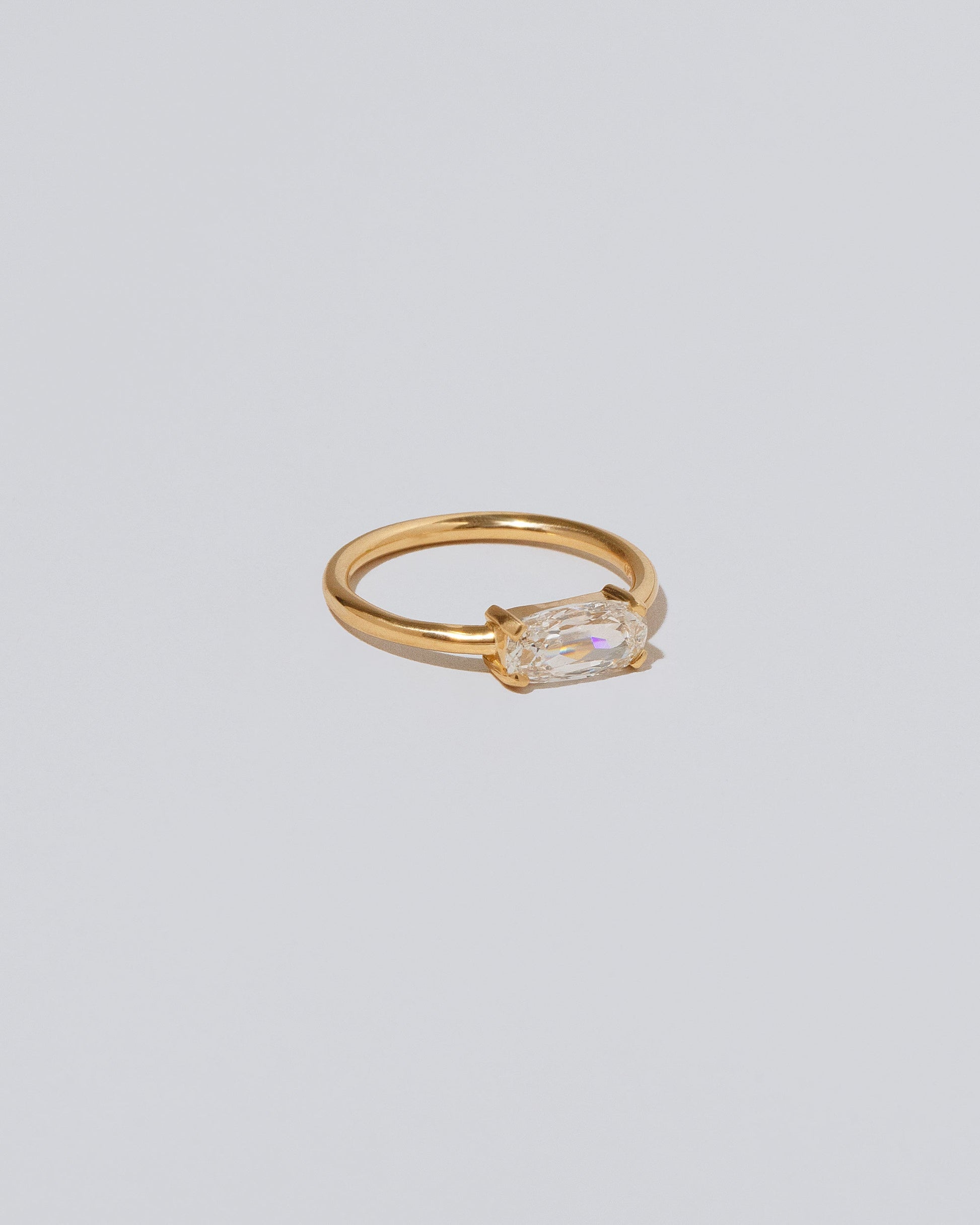 View from the side of the Adage Ring on light color background.