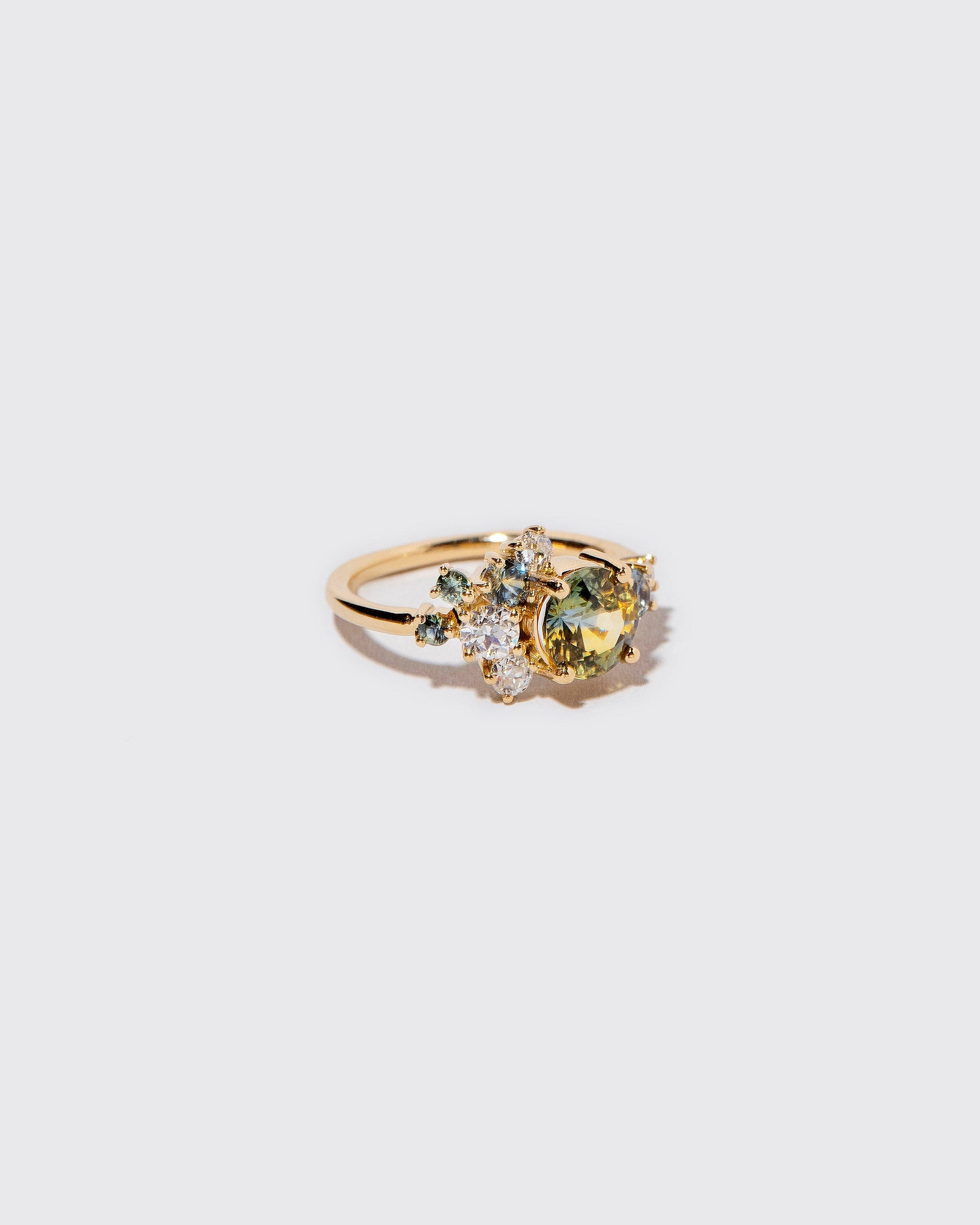  Vega Ring - Bicolor Sapphires on light color background.