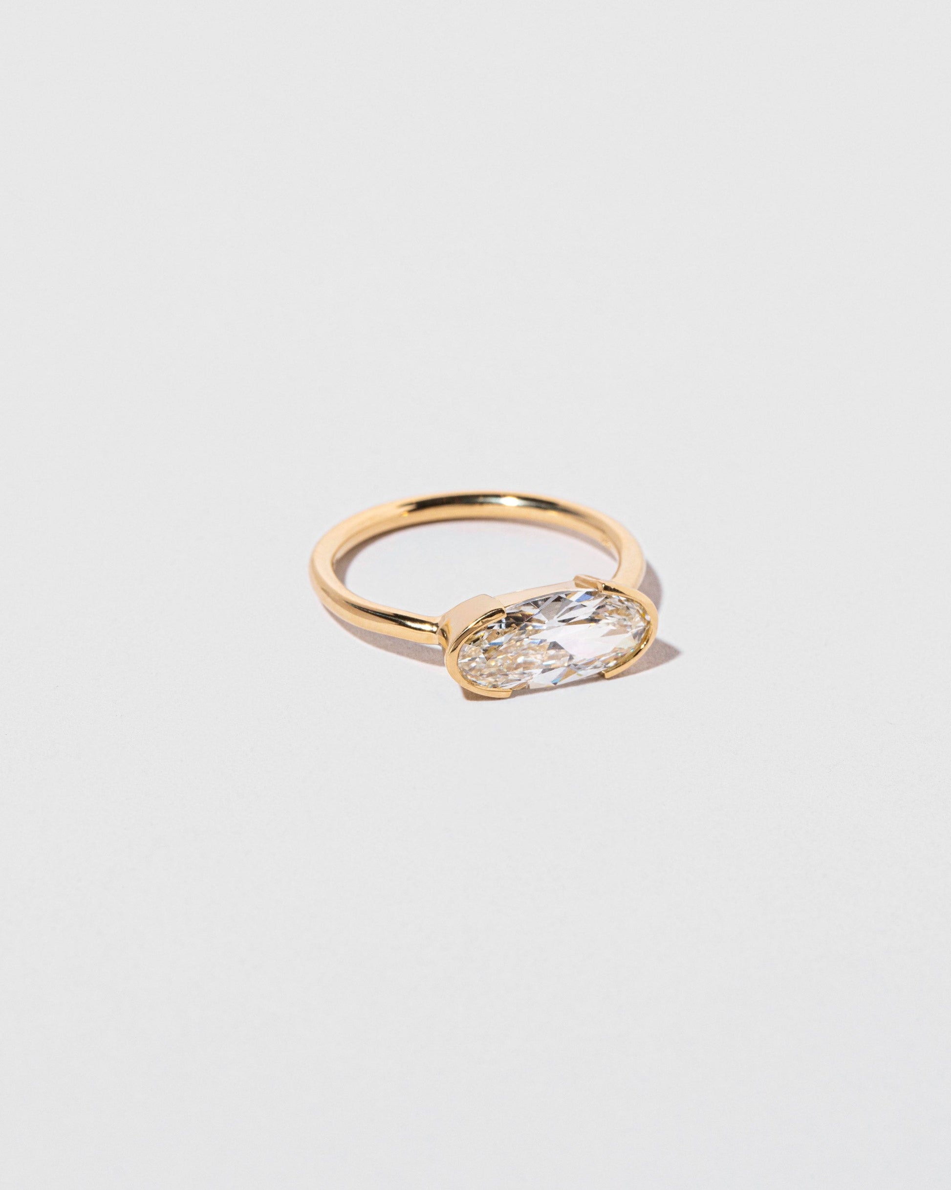 View from the side of the Eternal Ring on light color background.