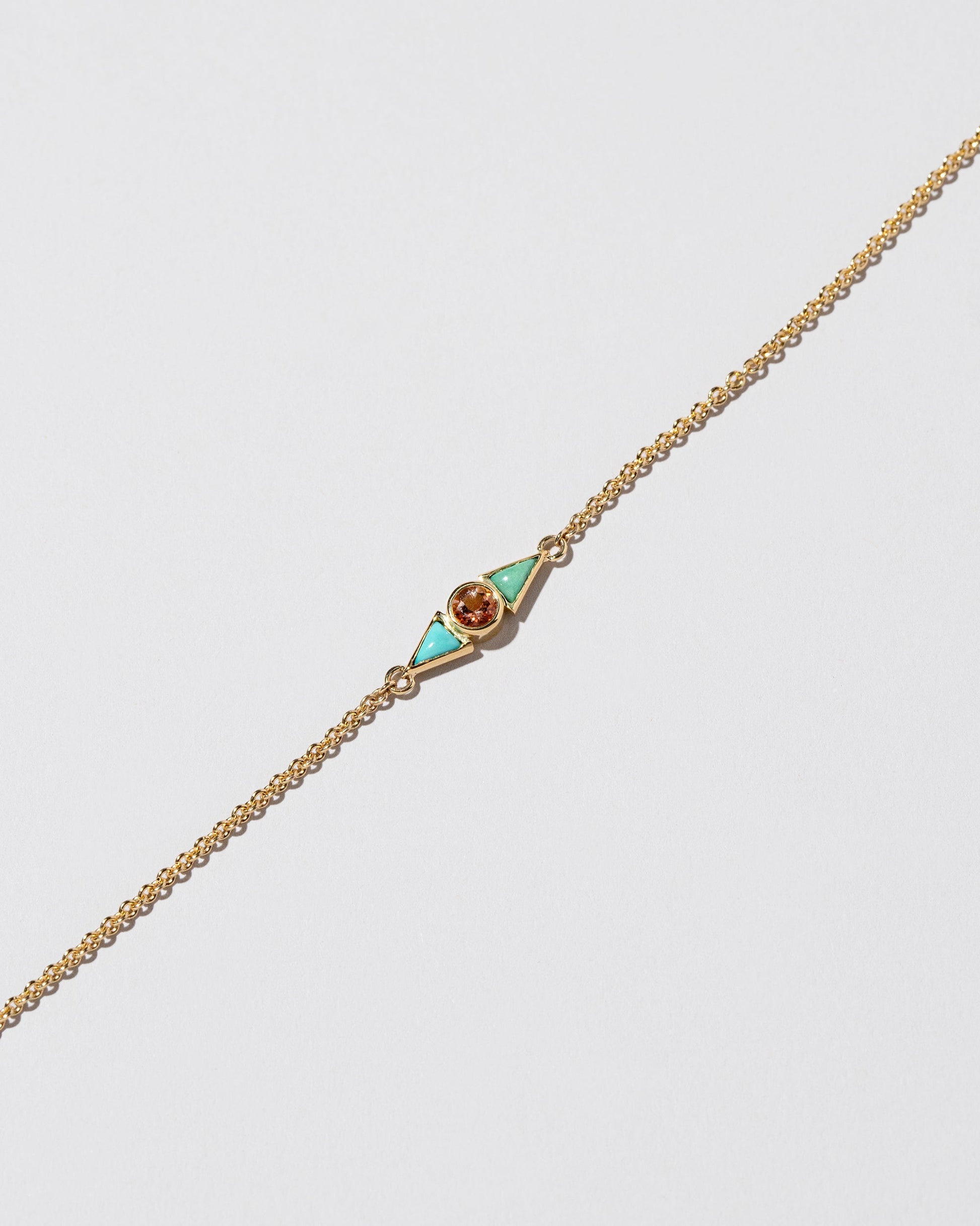  Sunstone & Turquoise Eye Bracelet on light color background.