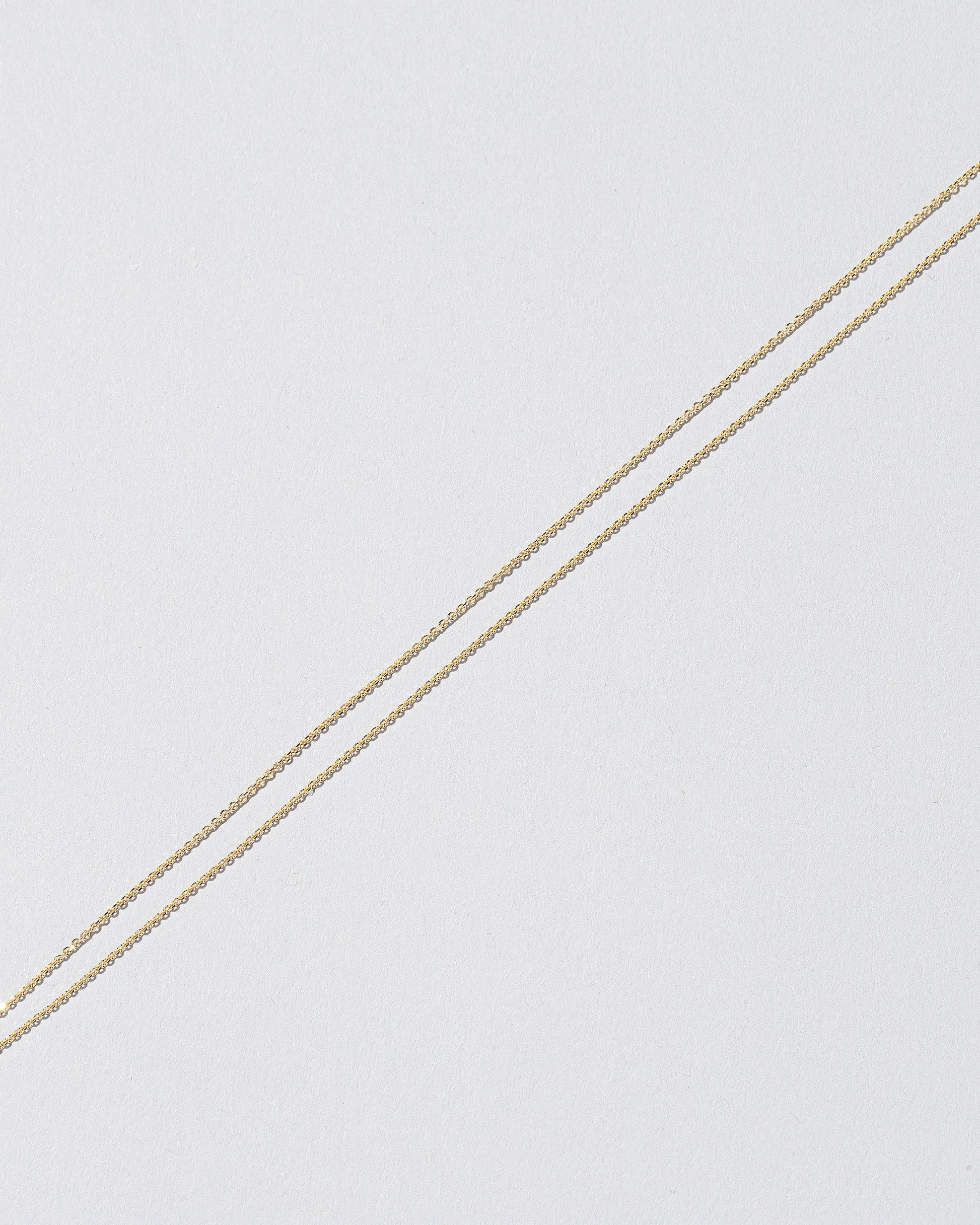  Sapphire Pendant on light color background.