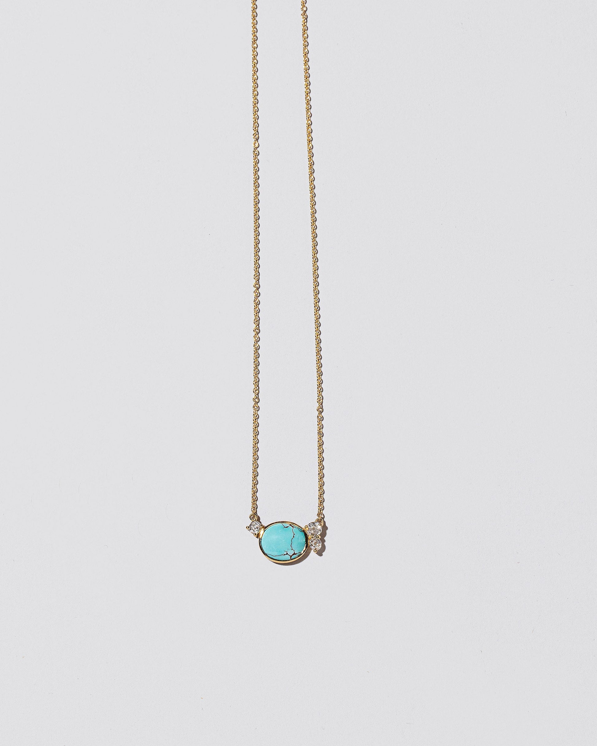 Rain Necklace on light color background.