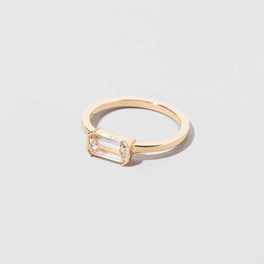 product_details::Closeup details of the Tethys Diamond Ring on light color background.