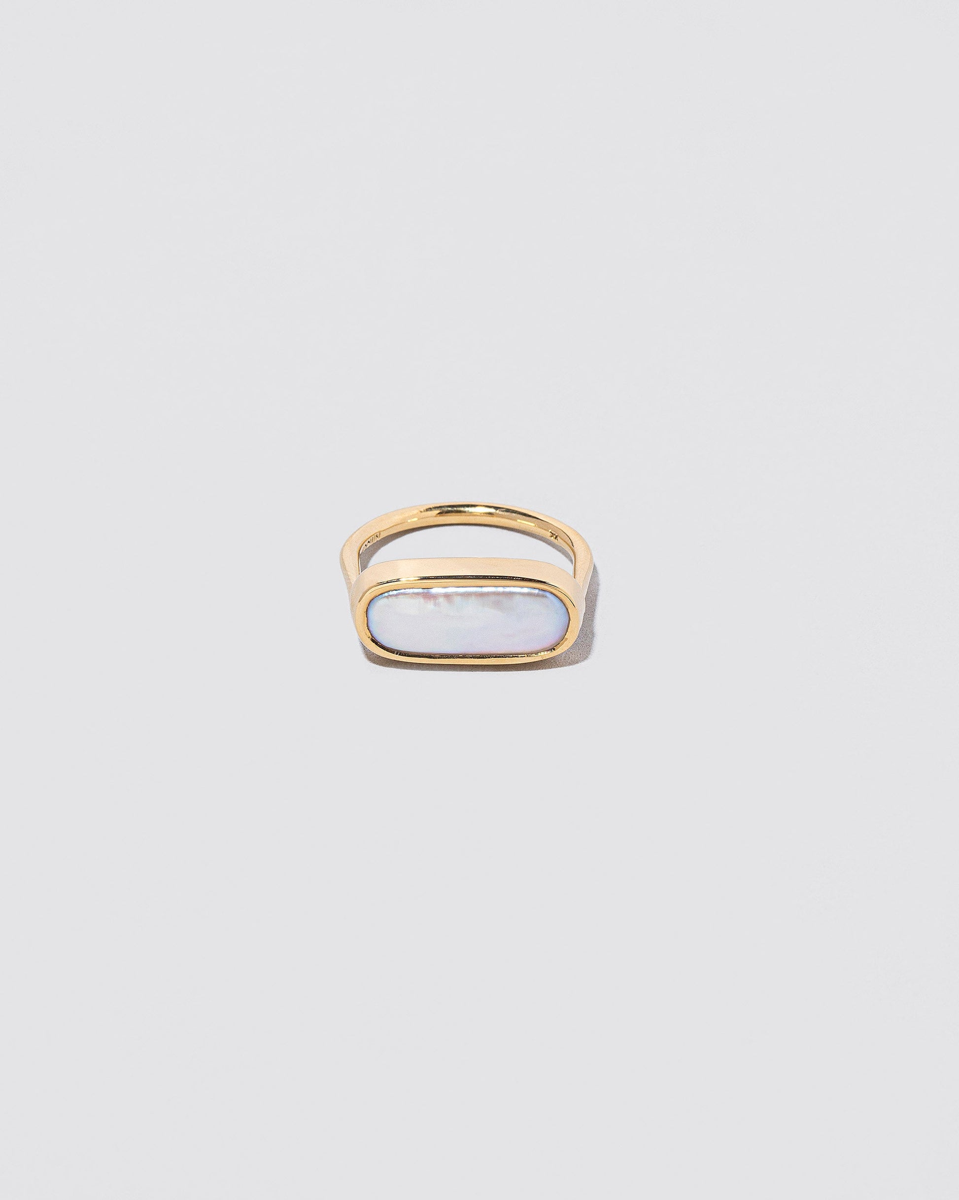 Antaeus Ring on light color background.