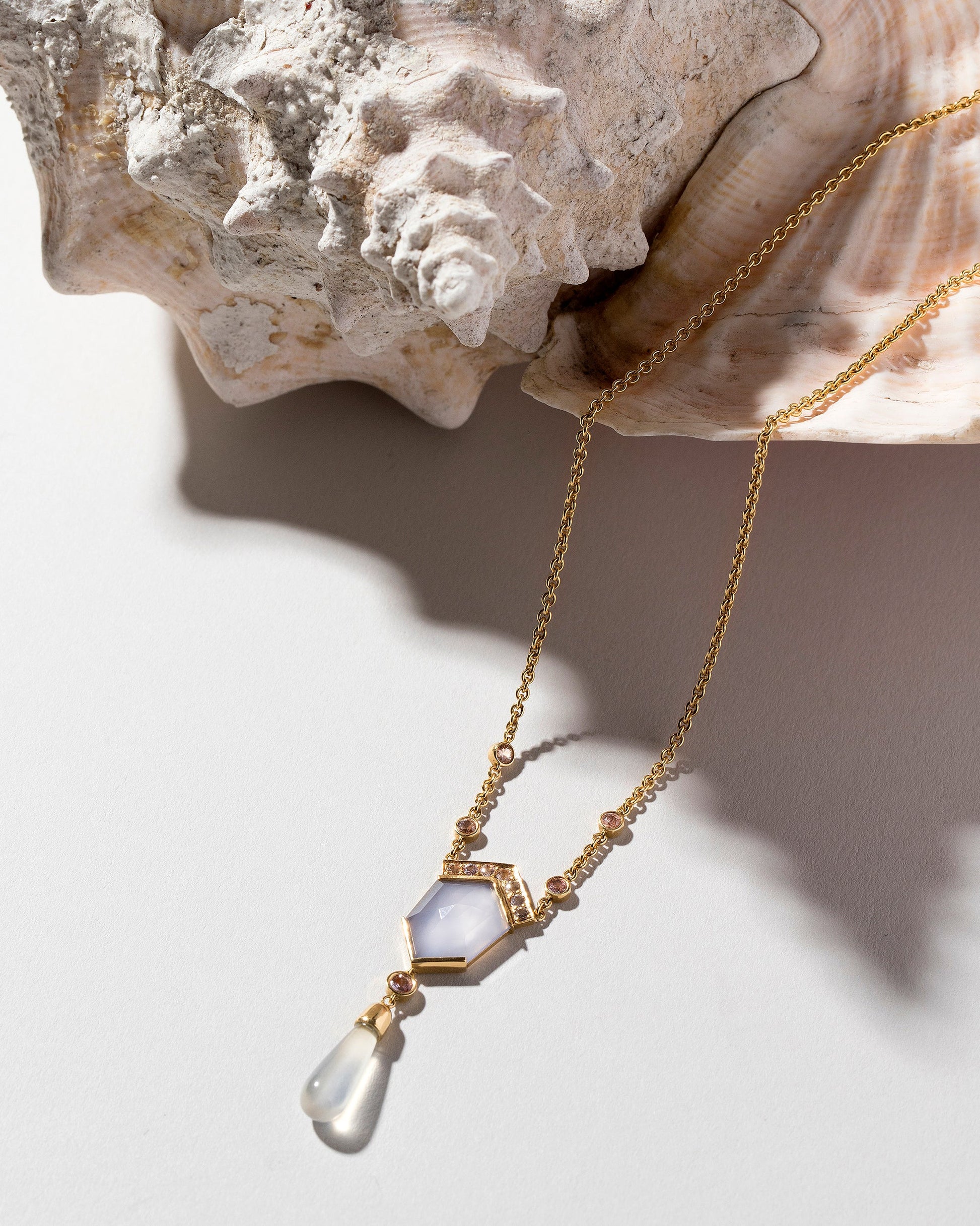  Blue Chalcedony Kite Necklace on light color background.