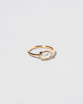 View from the side of the Moly Ring on light color background.