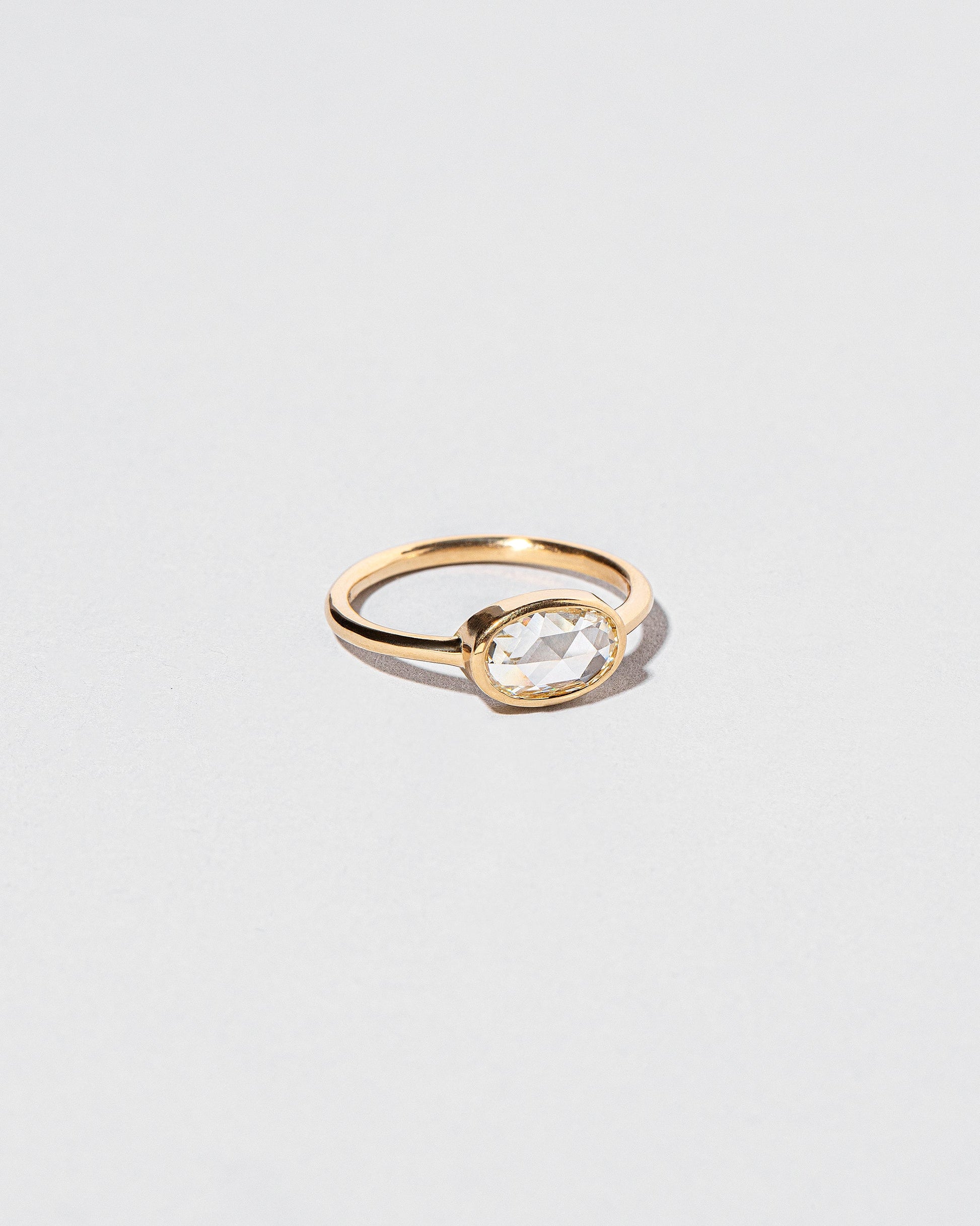 View from the side of the Moly Ring on light color background.