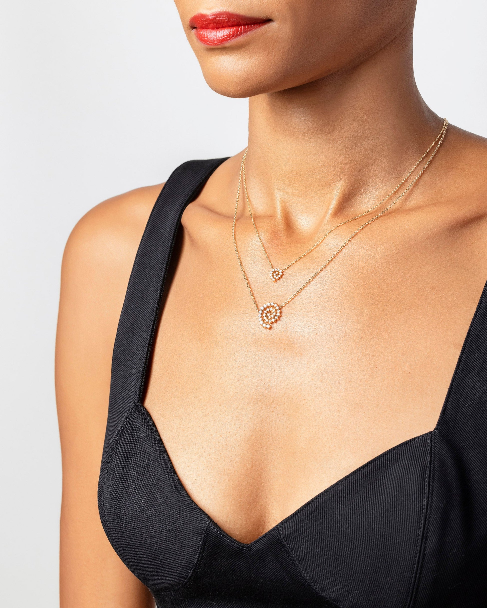 Full and Mini Spiral Necklaces on model.