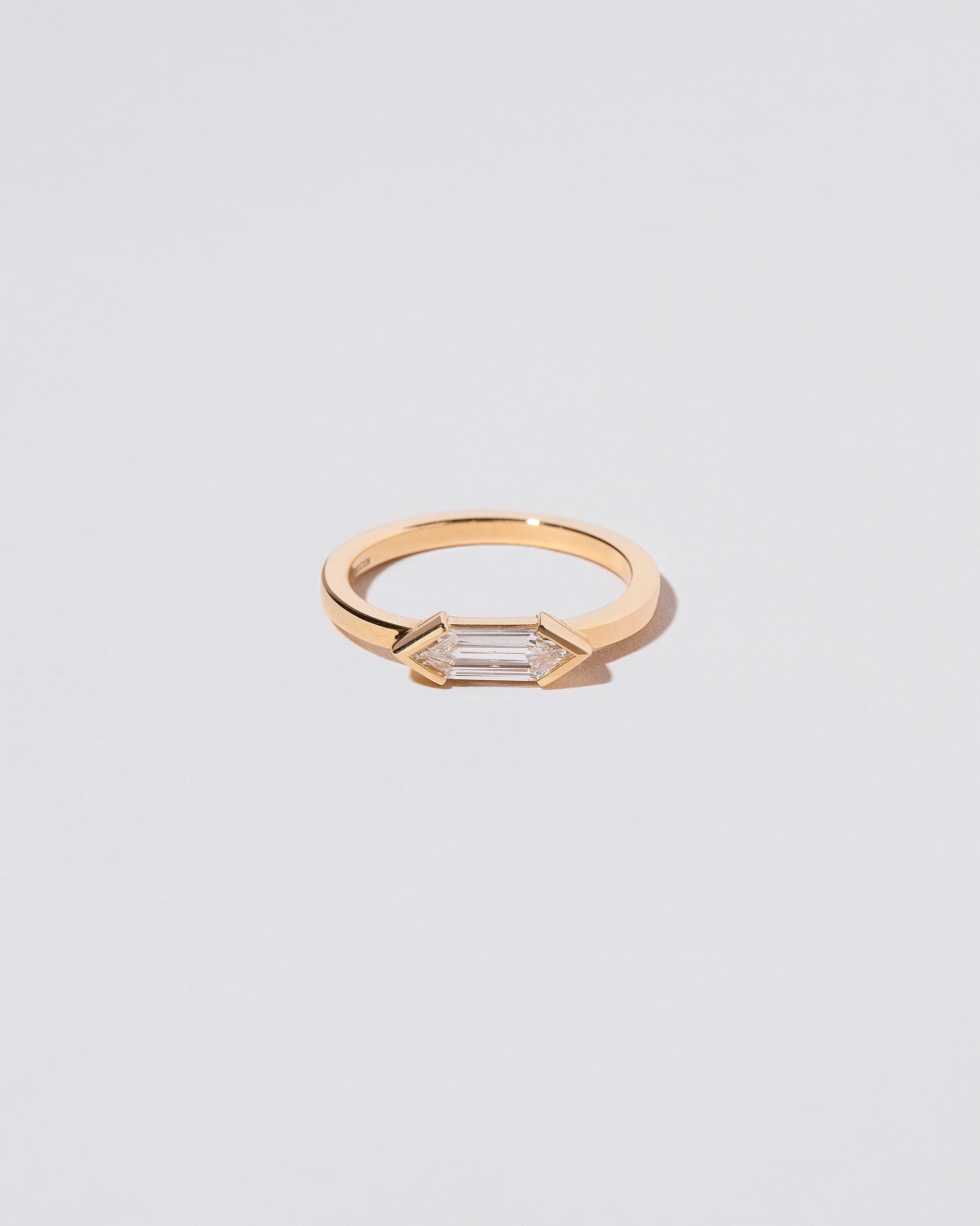 Paradise Ring on light color background.