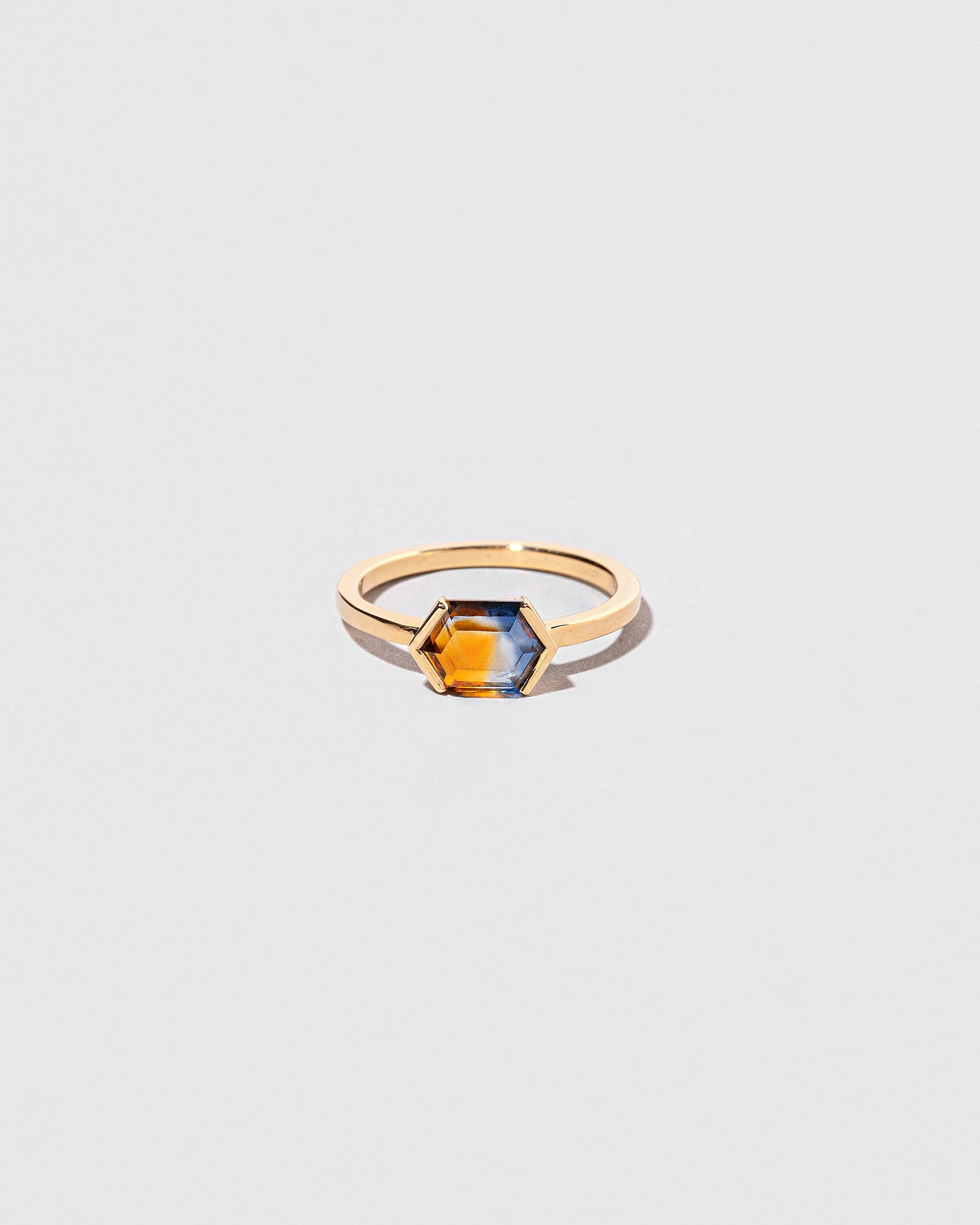 Elanor Ring on light color background.