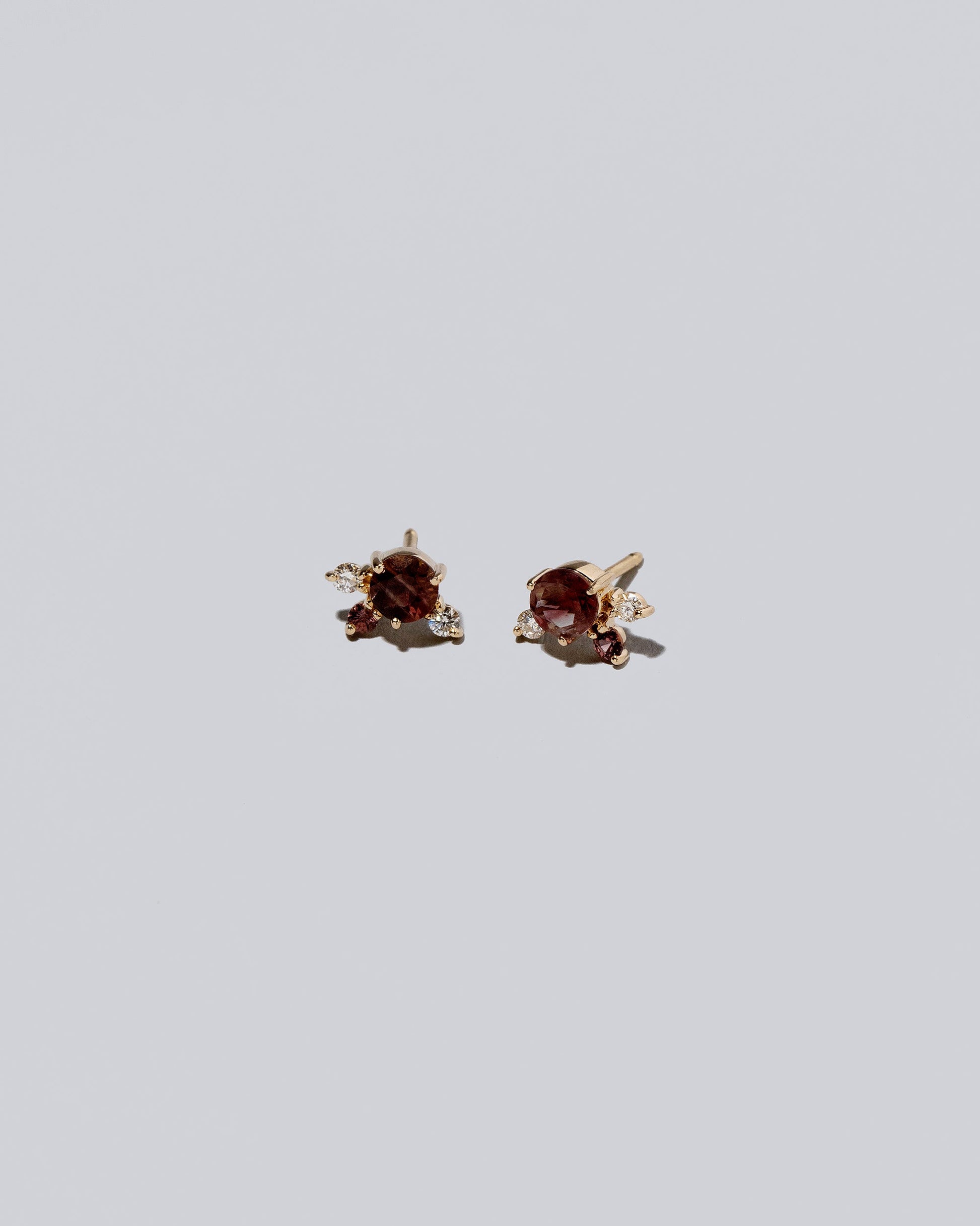 Cluster Stud Earrings - Oregon Sunstone on light color background.