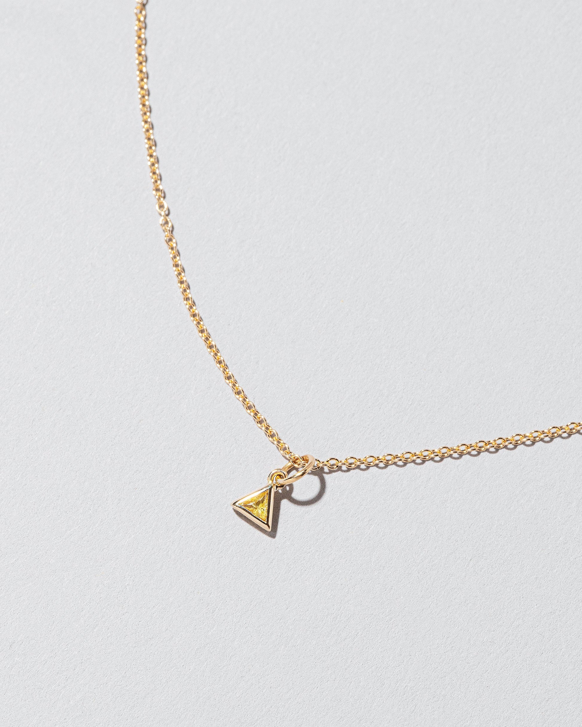  Sapphire Pendant on light color background.