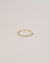 Gold Notched Band on light color background.