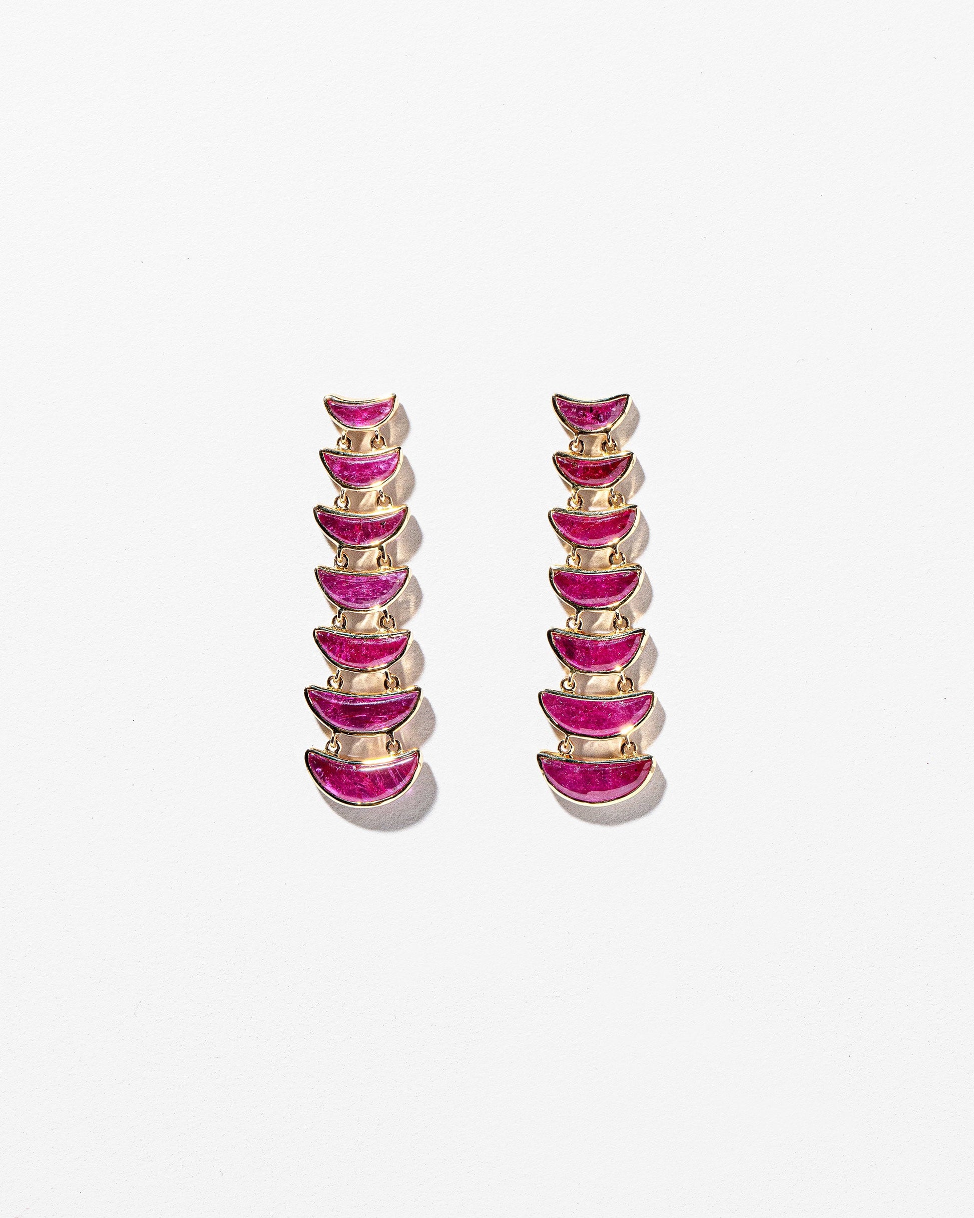 Flame Earrings on light color background.