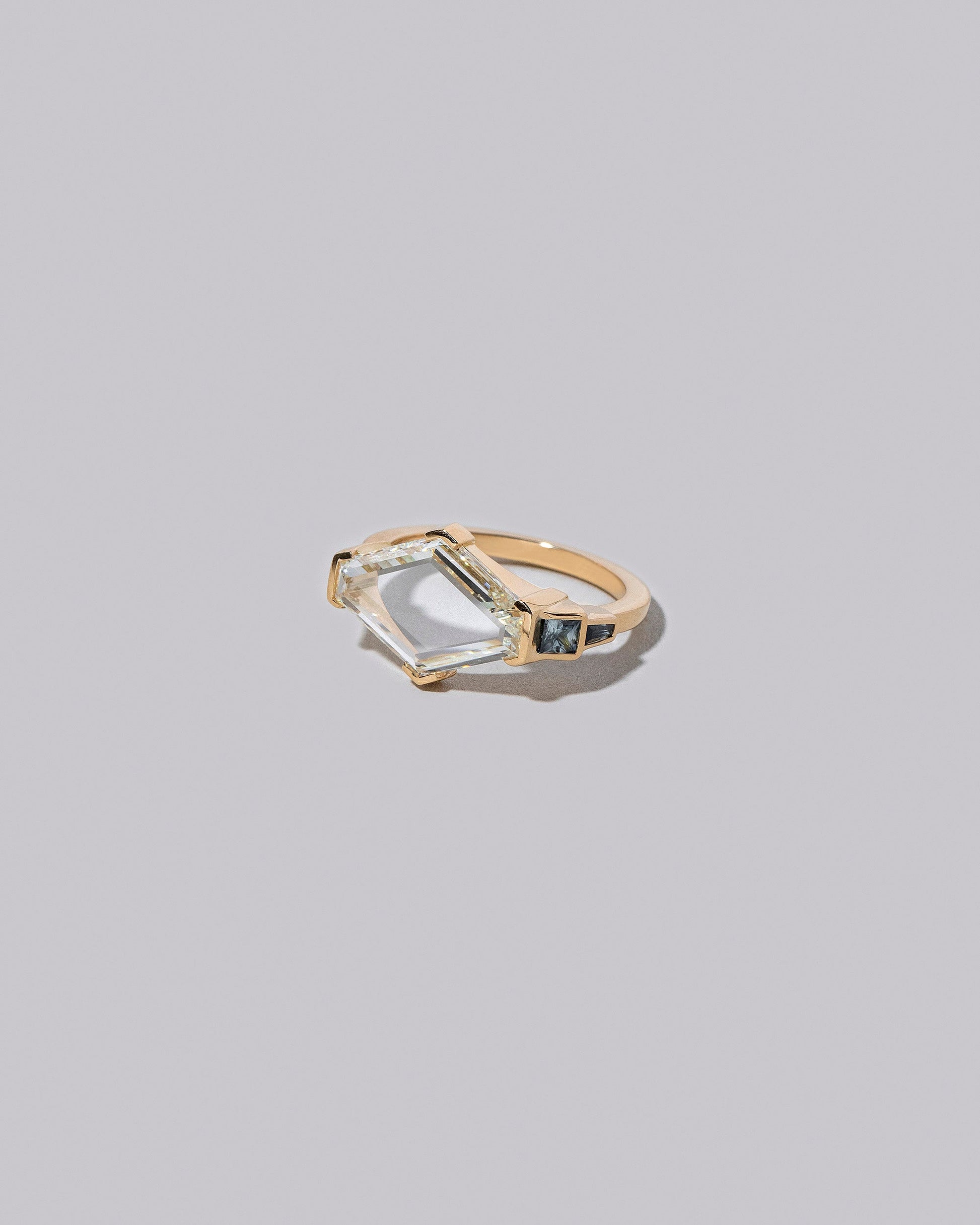 Katmai Ring on light colored background.