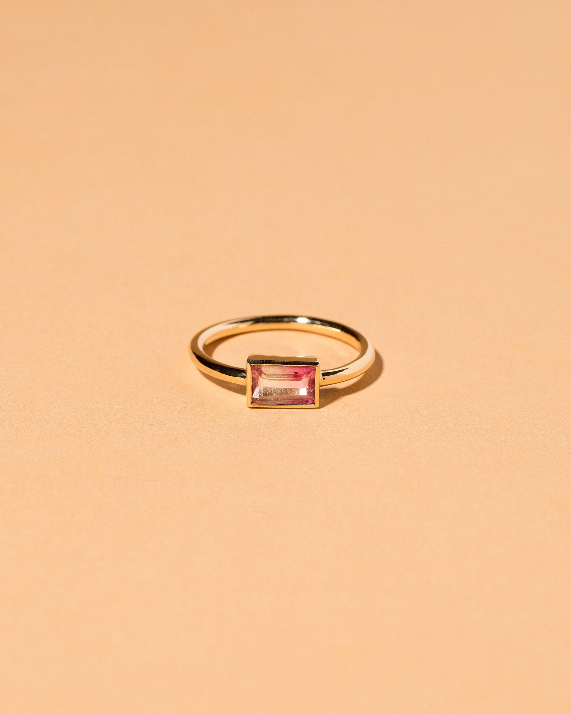 Pink & White Tourmaline Ring on light color background.