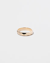 Gold 4mm Facet Band on light color background.
