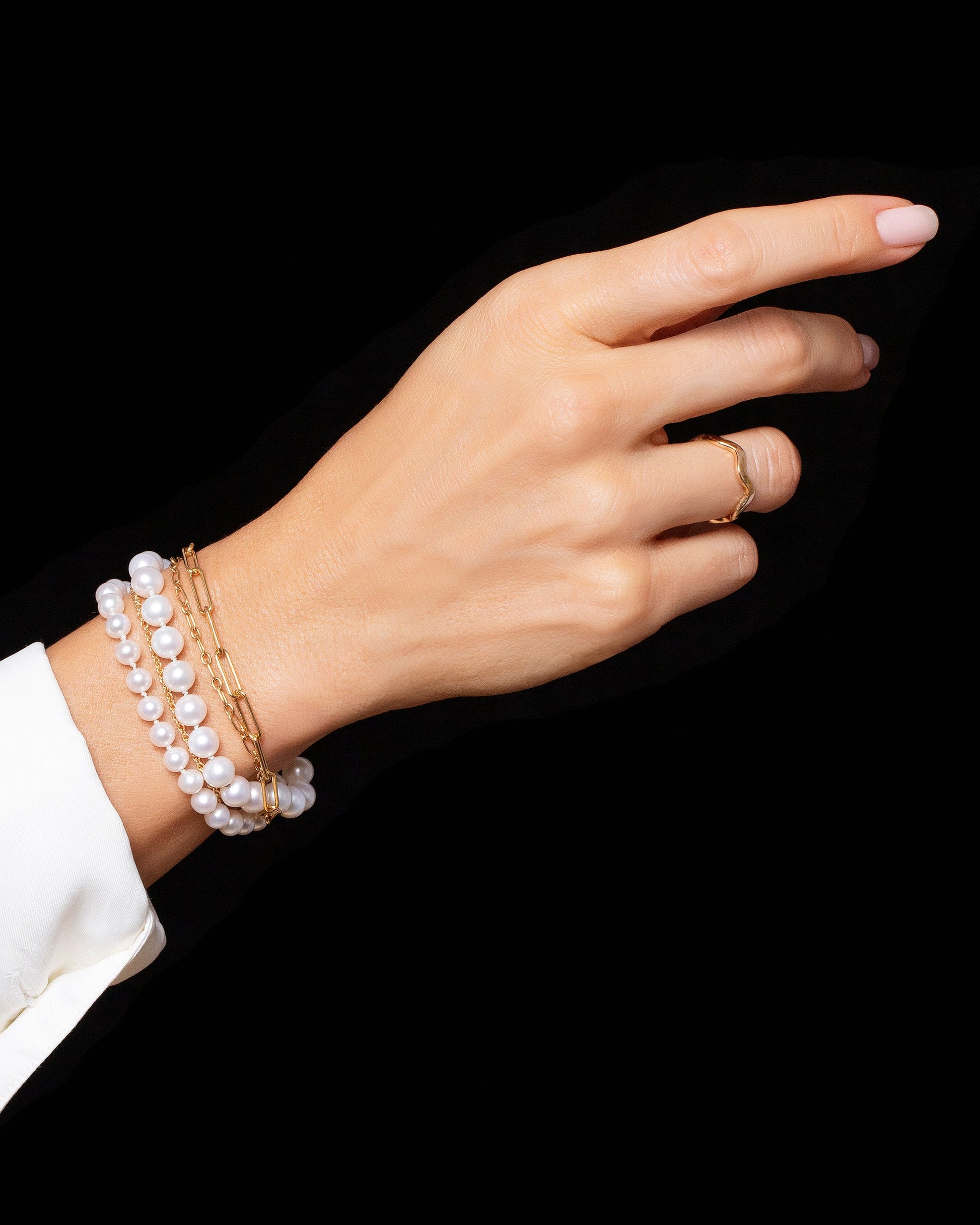 Layered Pearl Bracelet on model.