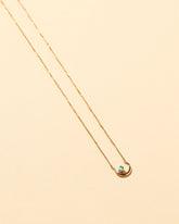  Moon Ray Necklace on light color background.
