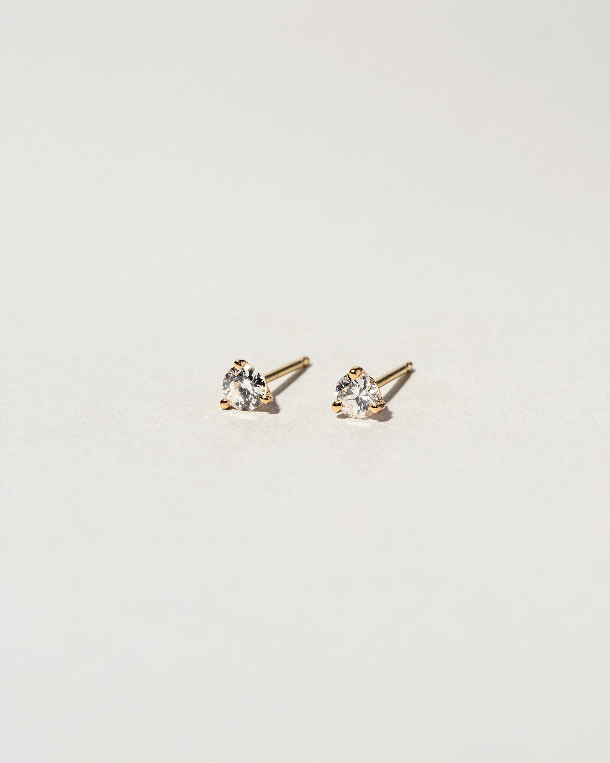  Martini Studs - White Diamond on light color background.