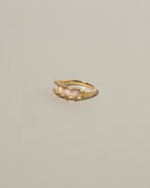  Five Triangle Ring - Pink Opal on light color background.