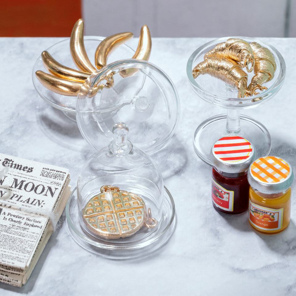 product_details::Styled photo featuring Croissant Charm