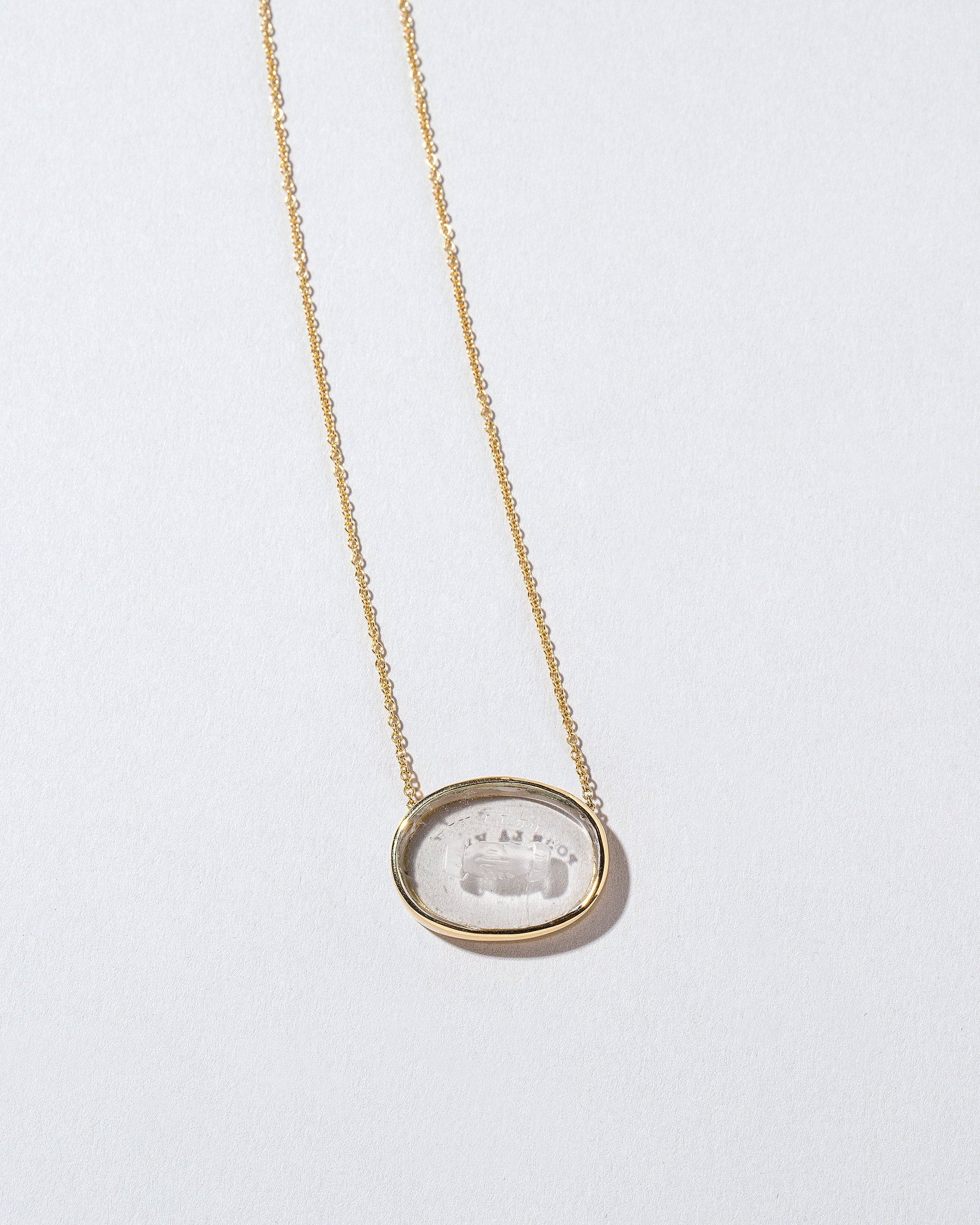  Eternity Intaglio Seal Necklace on light color background.