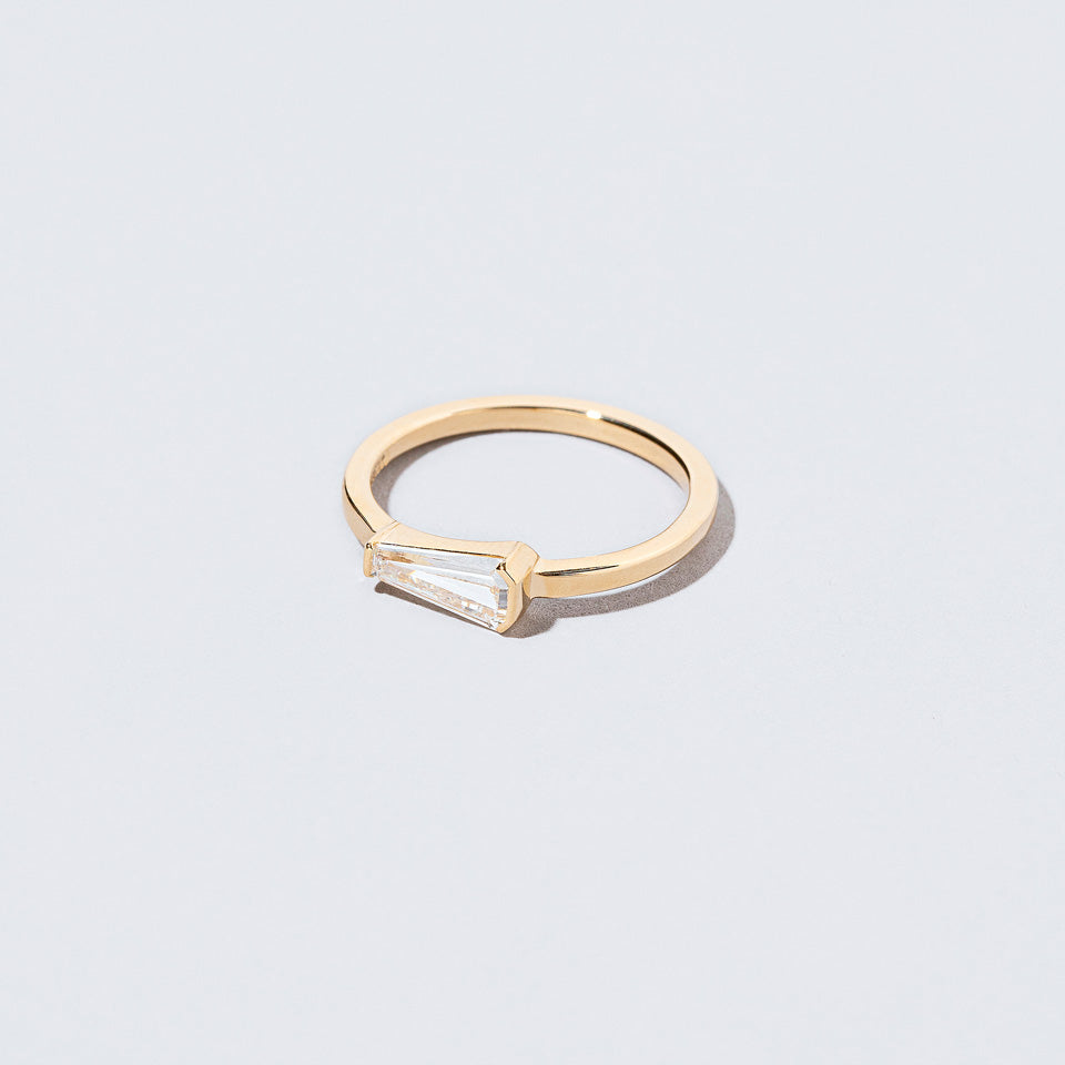 product_details::Closeup details of the Niphredil Ring on light color background.