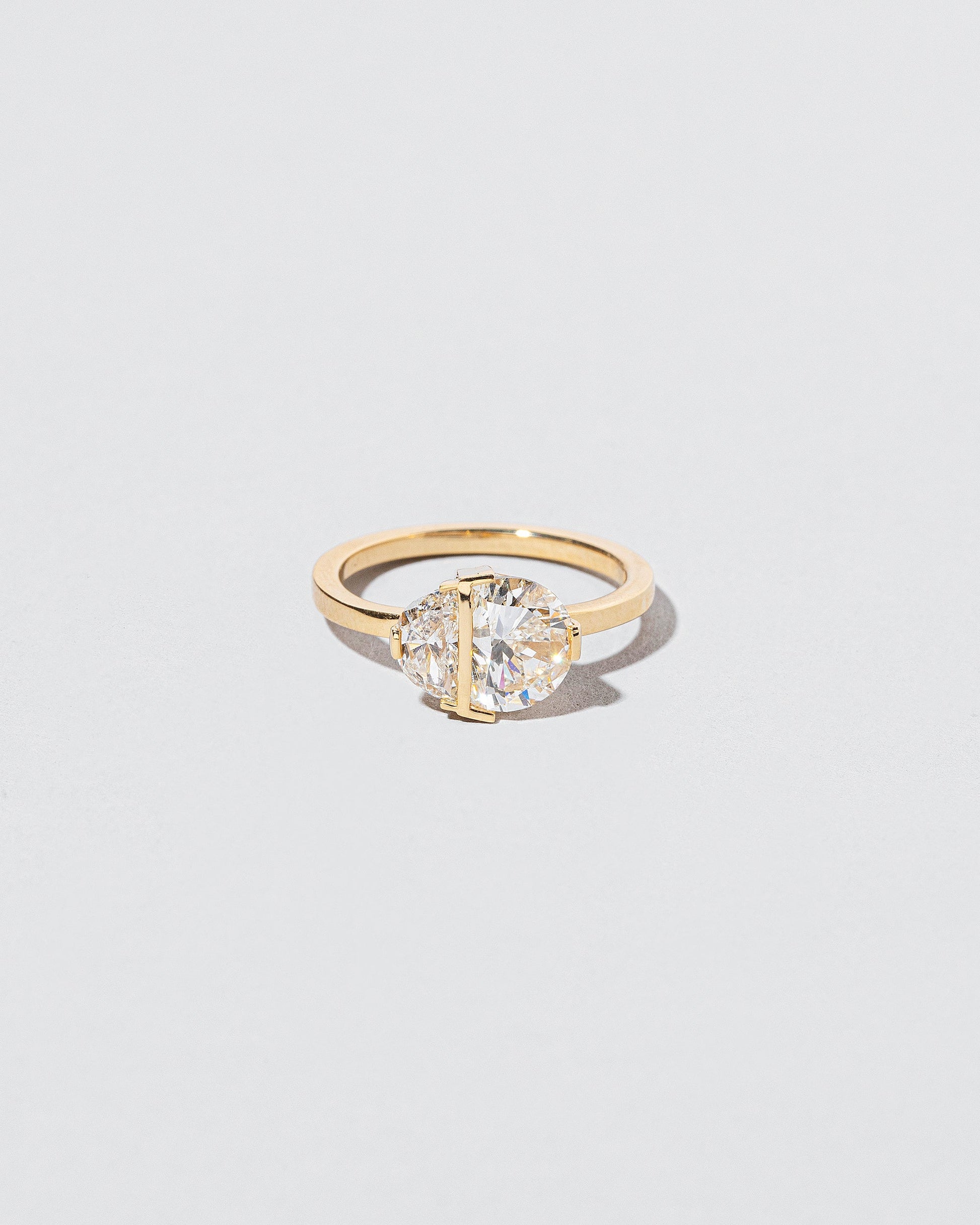  Many Worlds Ring on light color background.