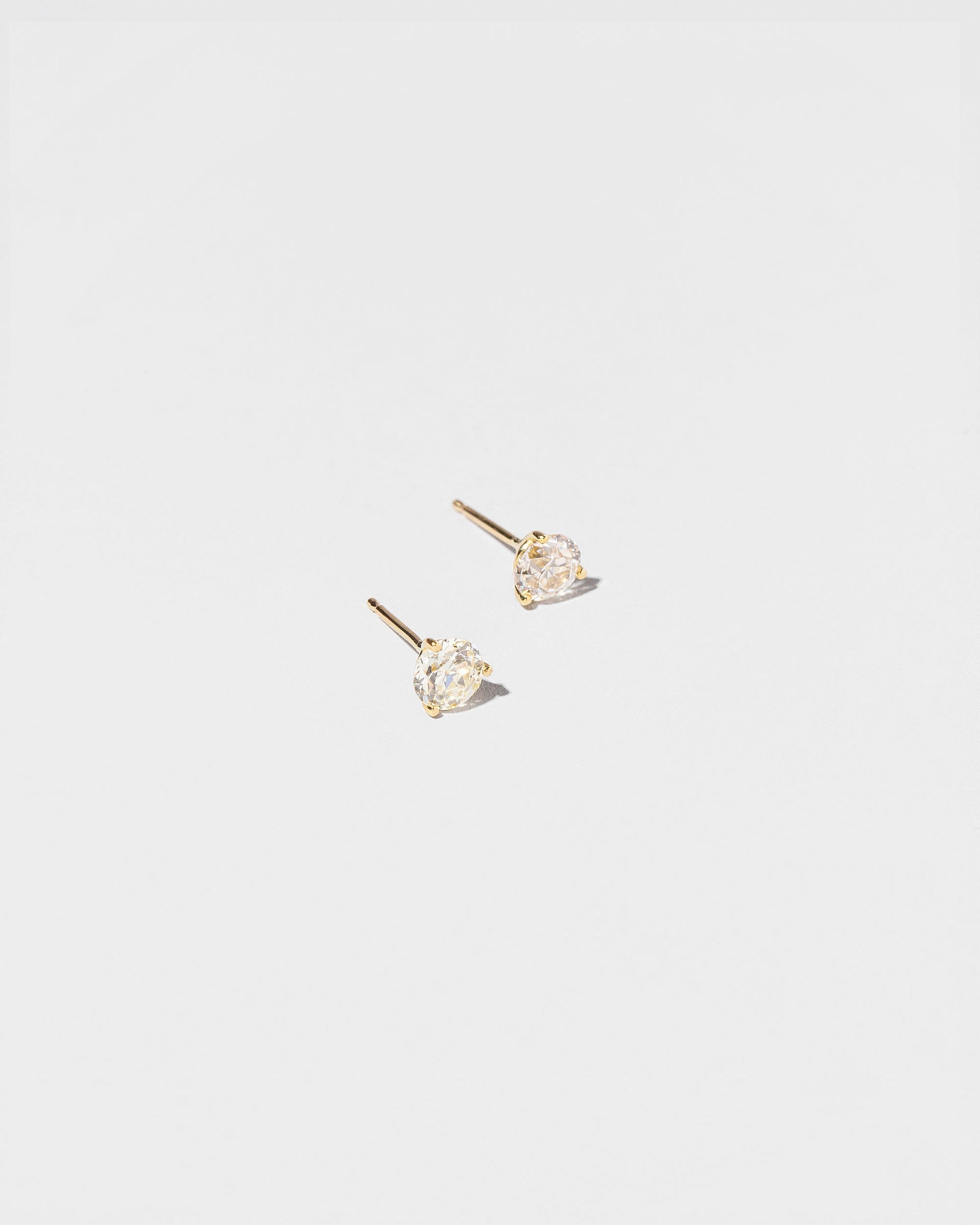  Martini Studs - White Diamond on light color background.