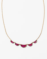 Invincibility Necklace on light colored background