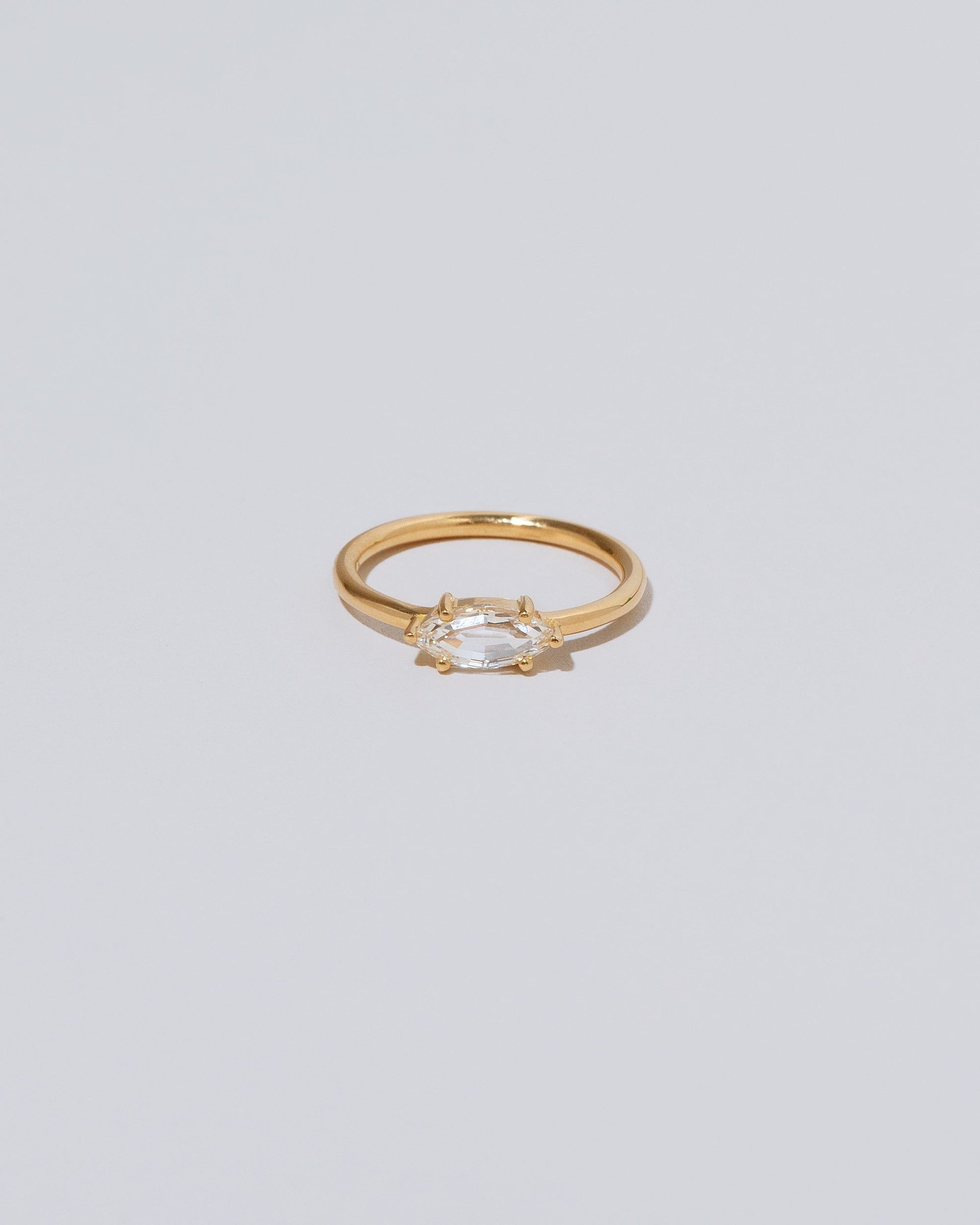 Ouvert Ring on light color background.