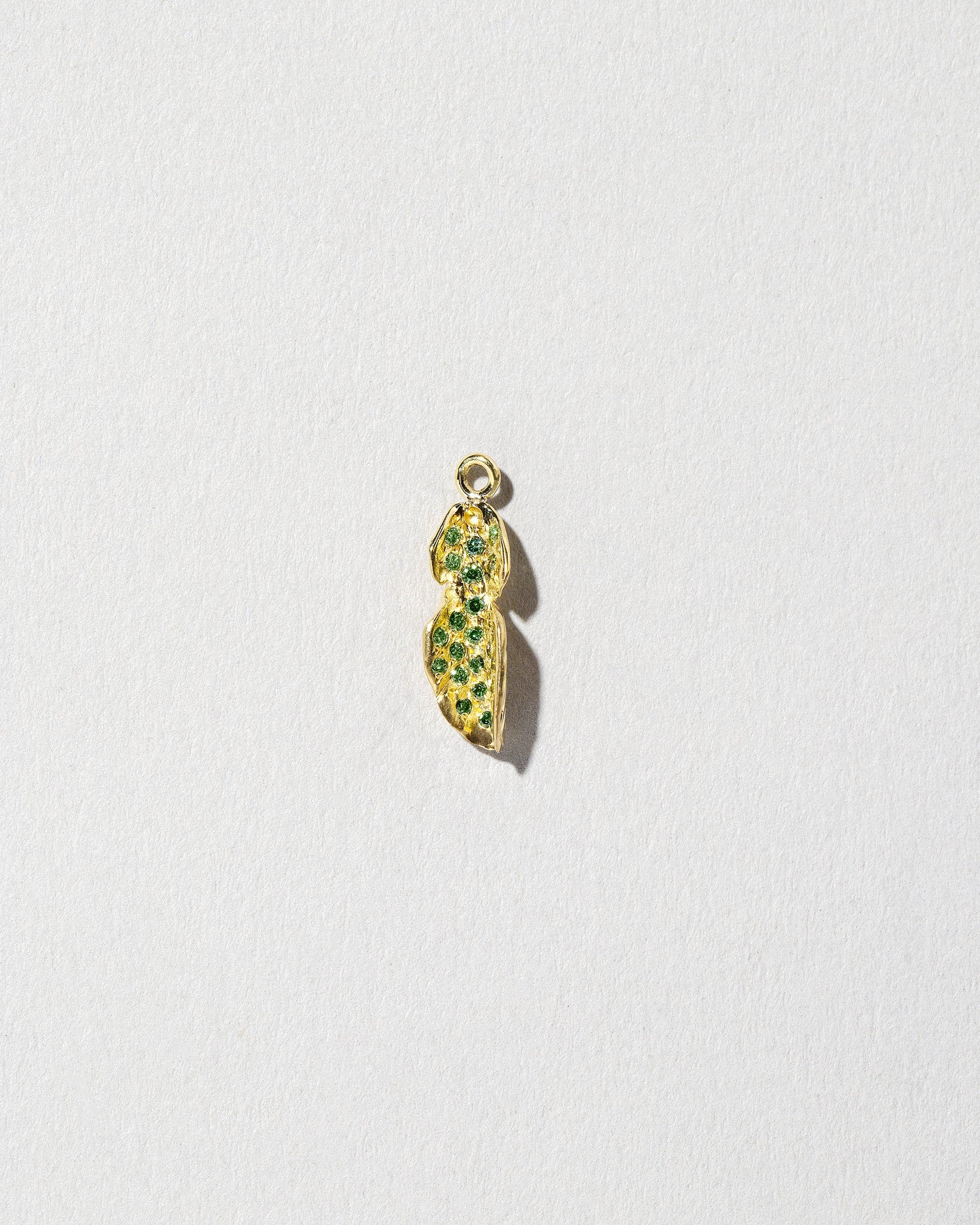 #2 Arugula Charm on light color background.