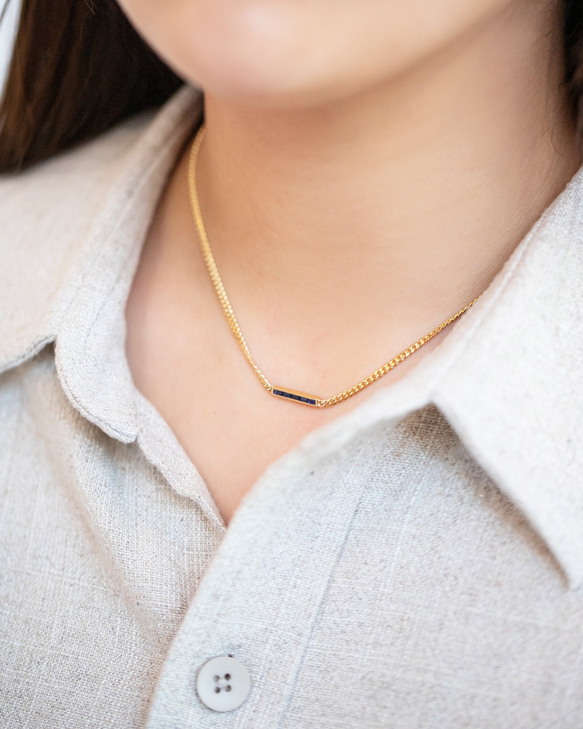 2.4mm Blue Sapphire Identity Chain Necklace on model.