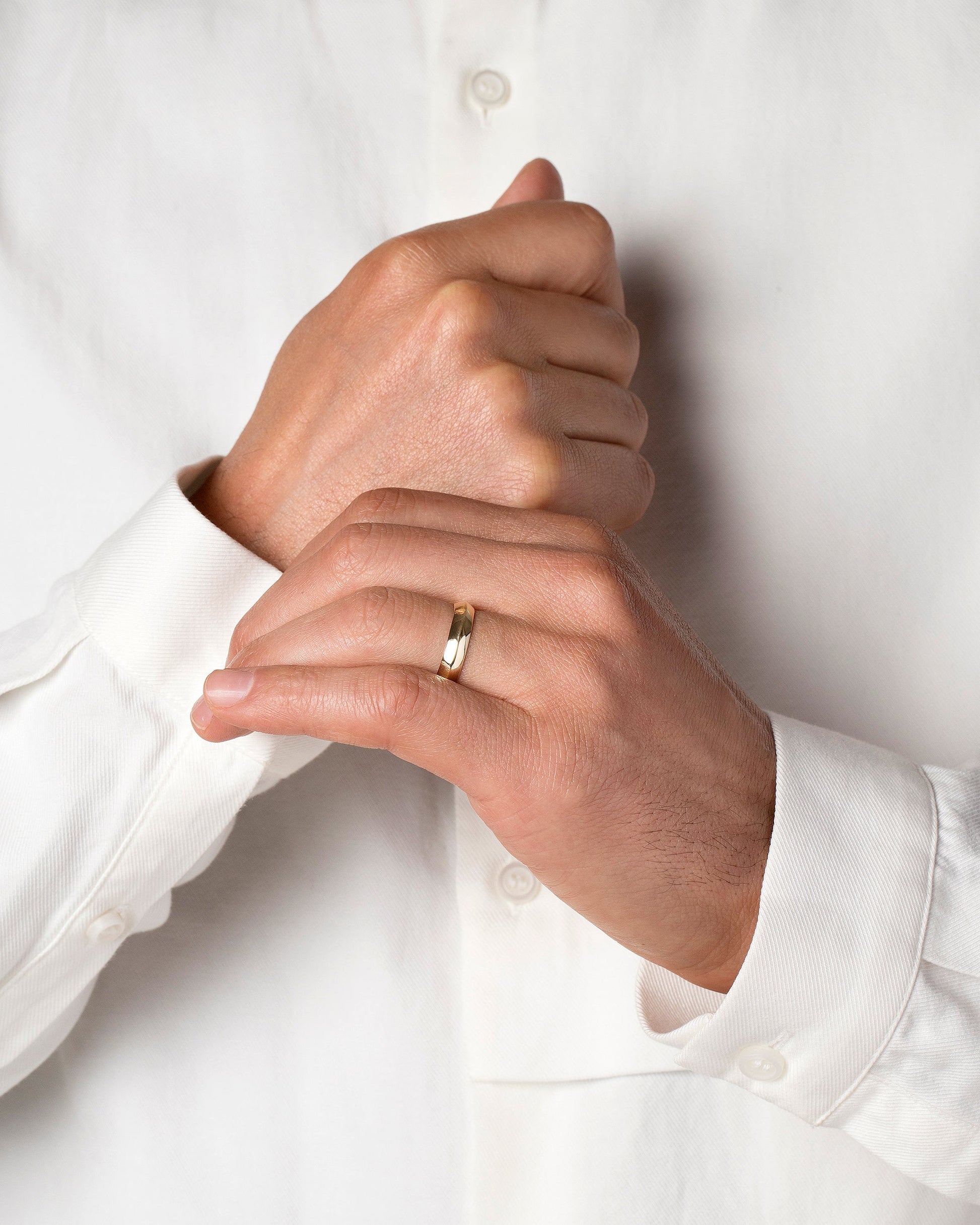 Gold 5mm Knife Edge Band on model.