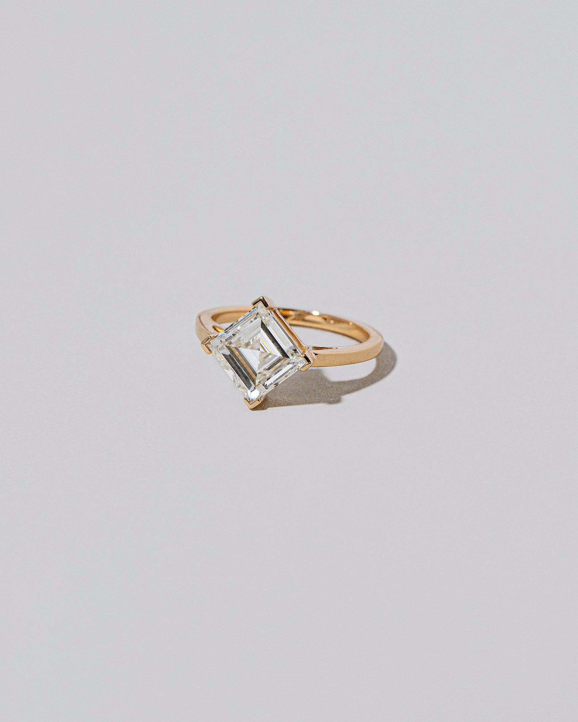 View from the side of the One Look Ring on light color background.