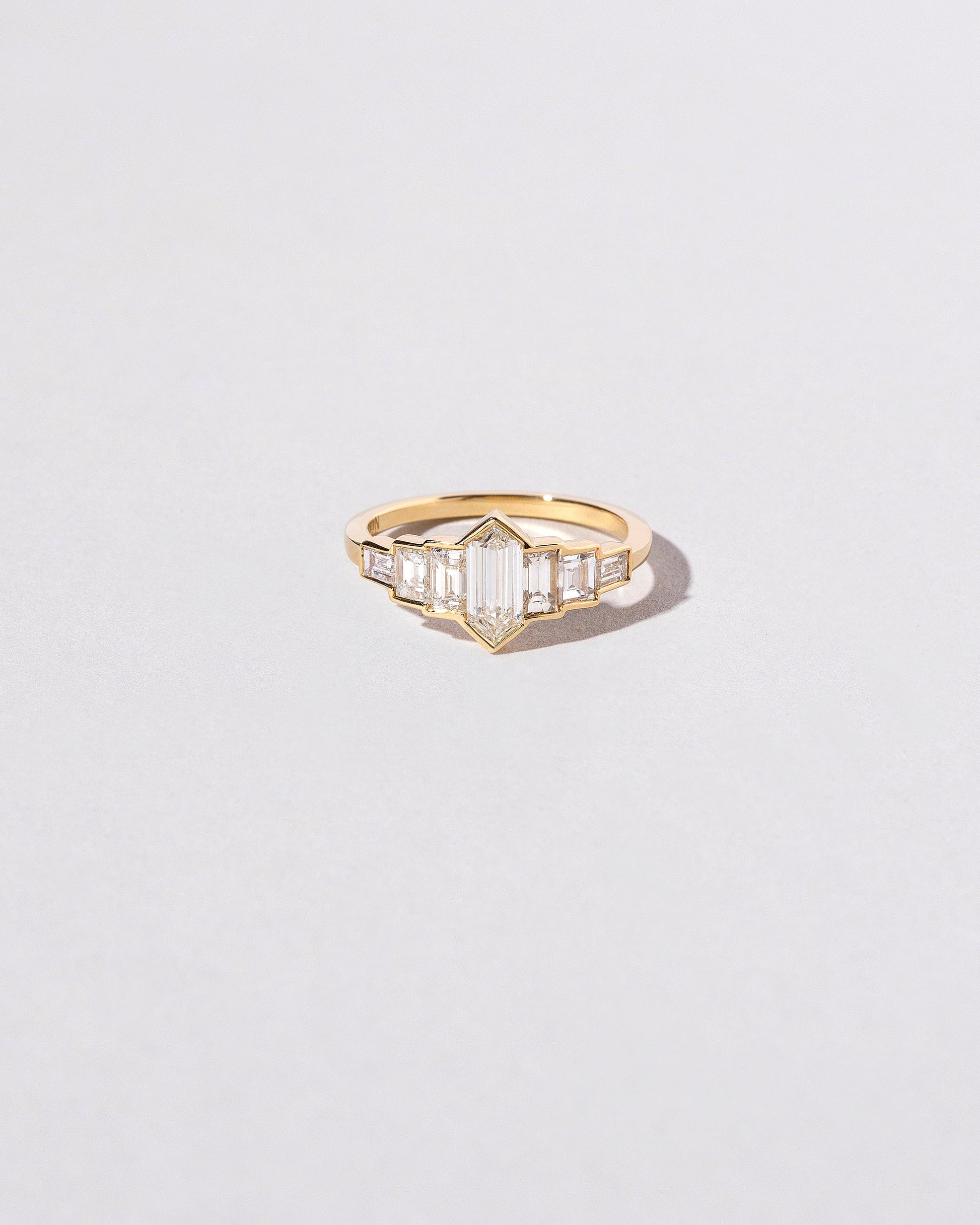  Septet Ring on light color background.