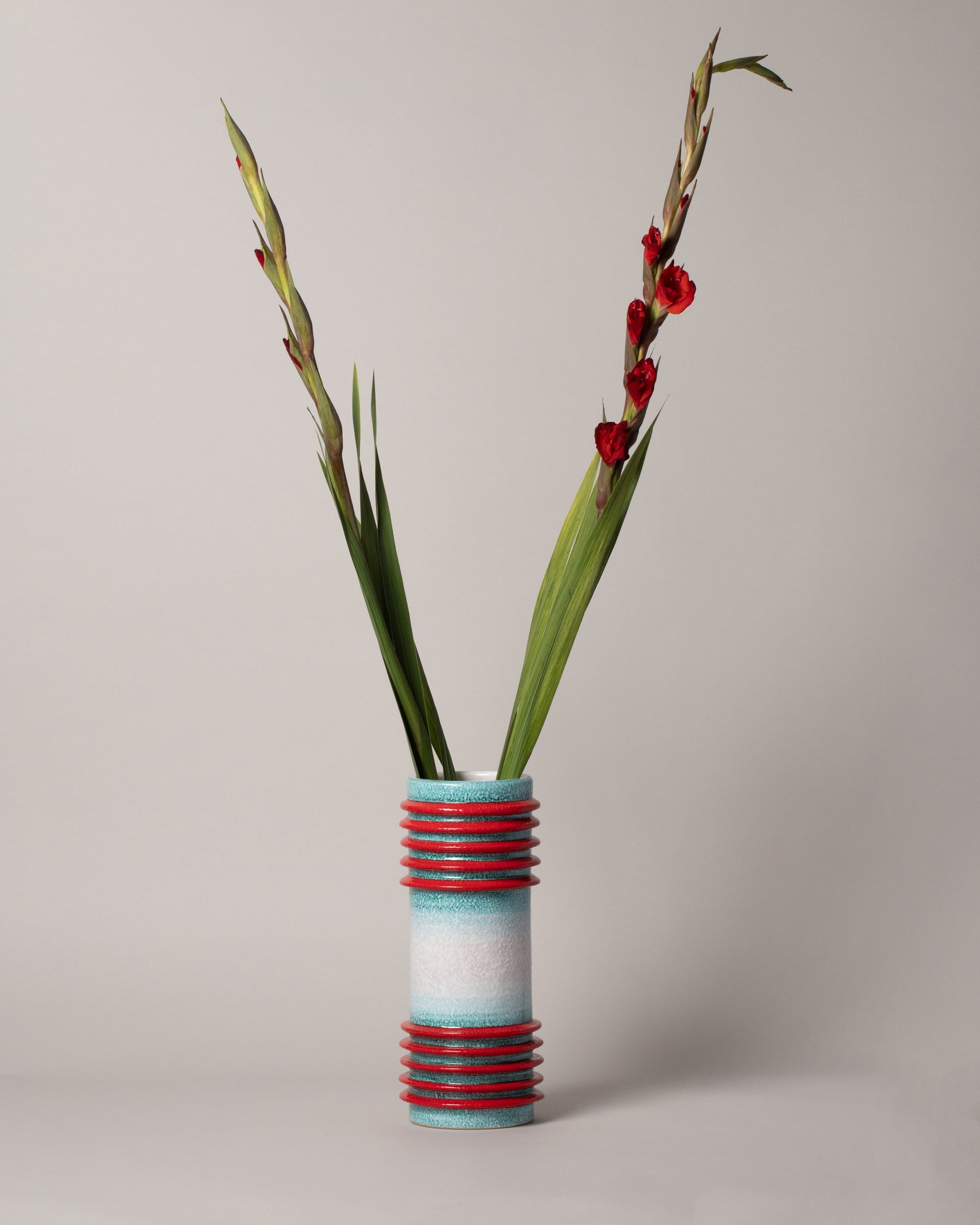 Styled image of  Mazzotti 1903 Motorato Assolutoo Vase on light colored background.