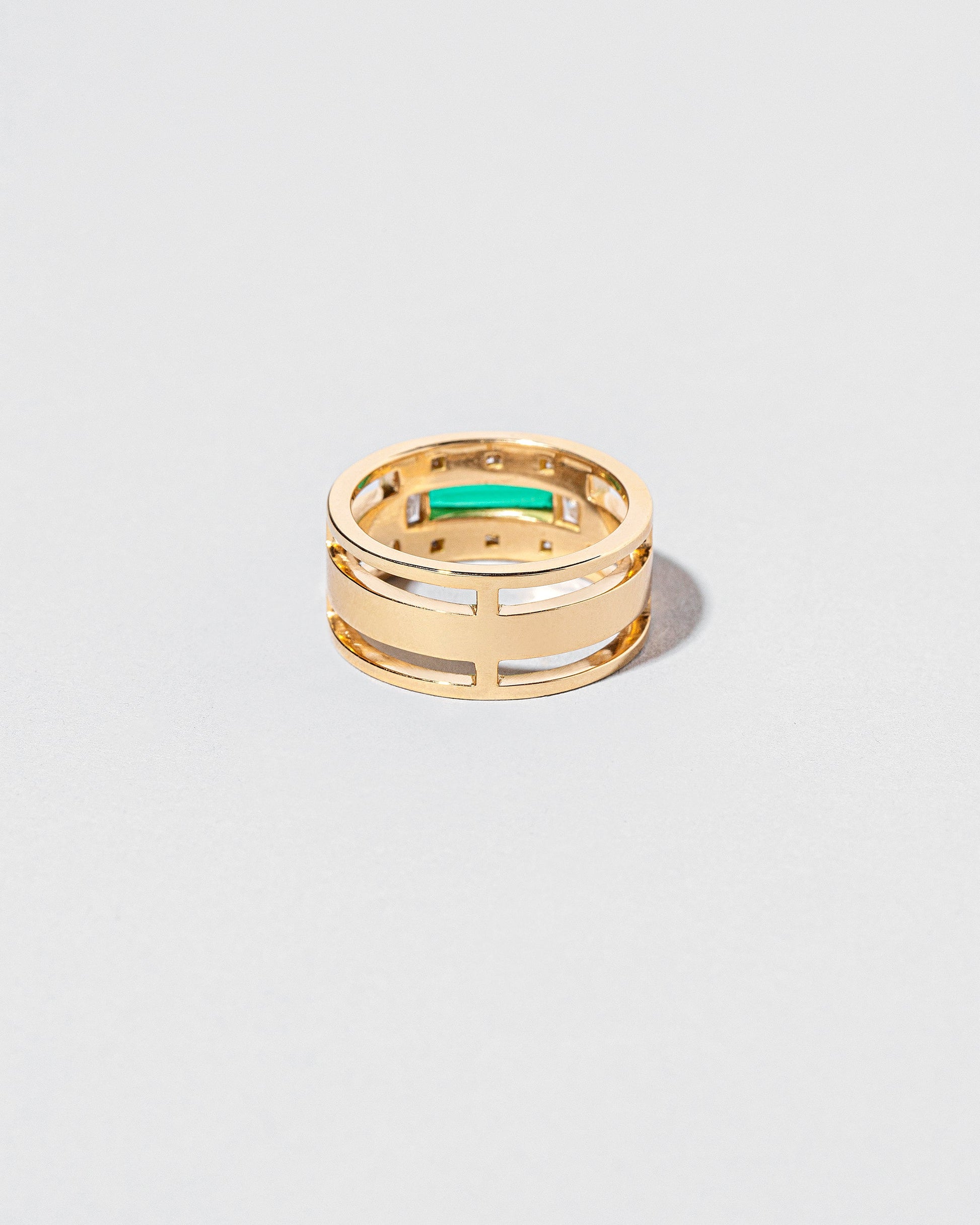  Sleeping Figure Ring on light color background.