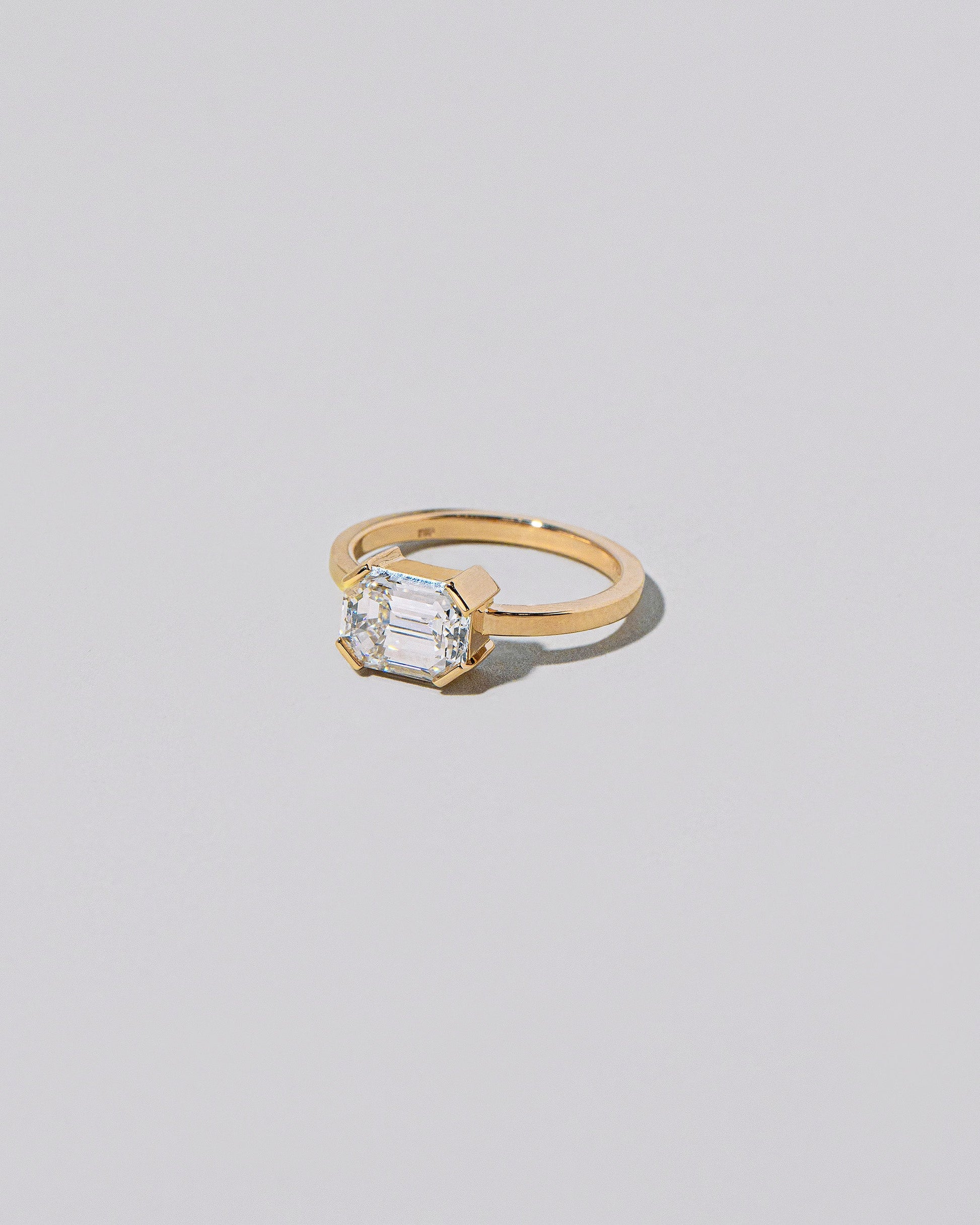 View from the side of the Born Ring on light color background.