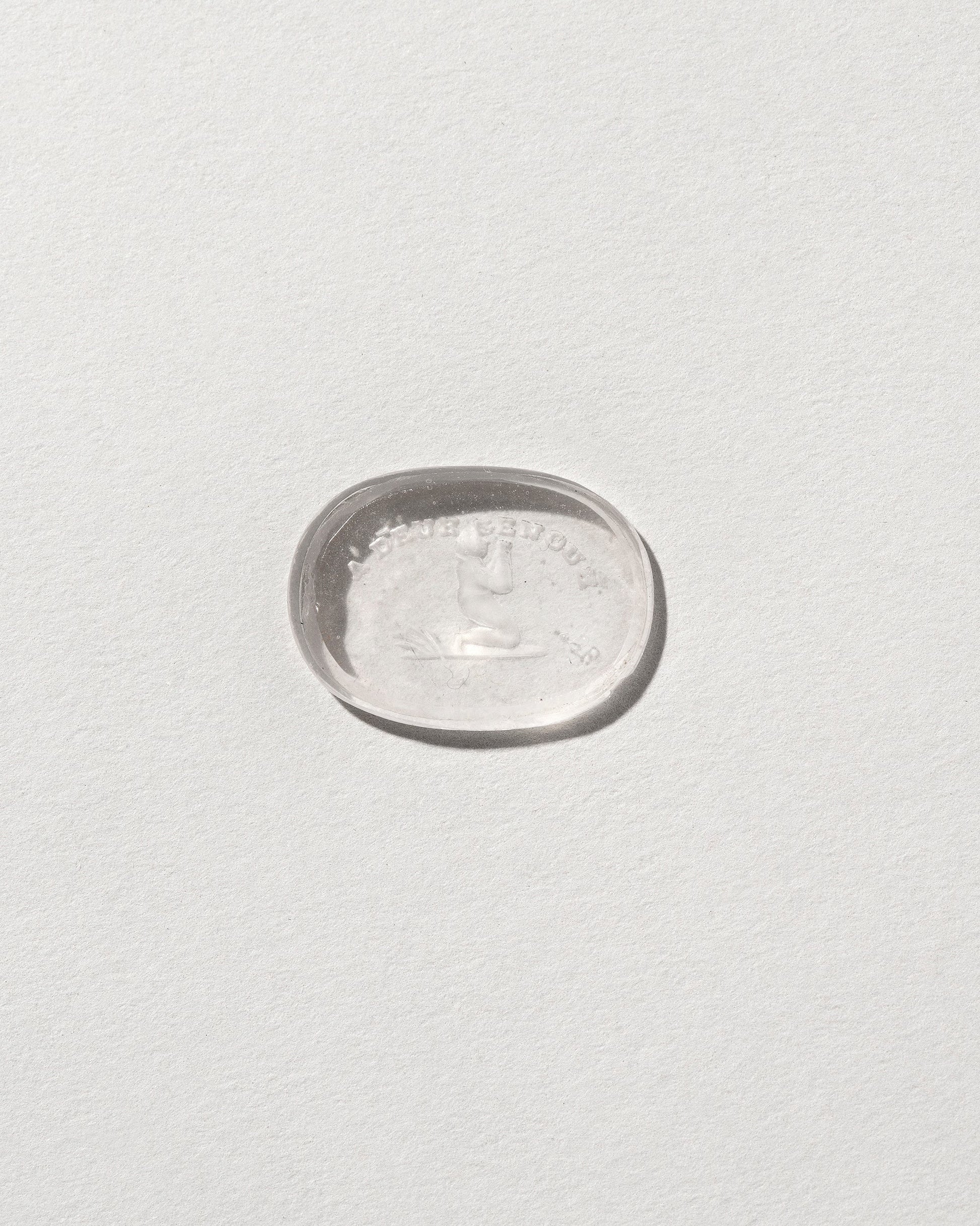  Devotion Intaglio Seal on light color background.